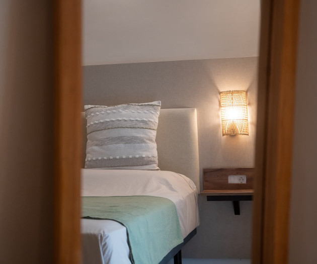 Bedroom headboard with wall light
