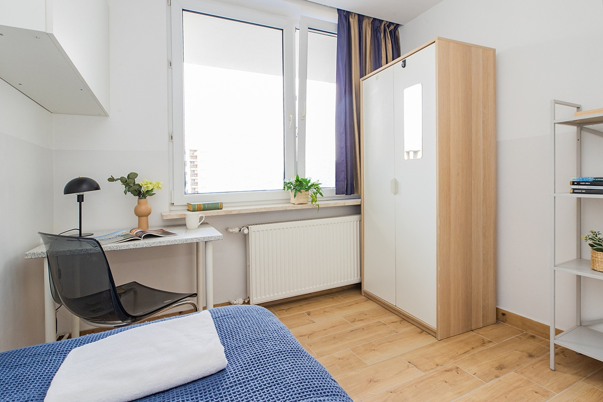 Bedroom with wardrobe and desk