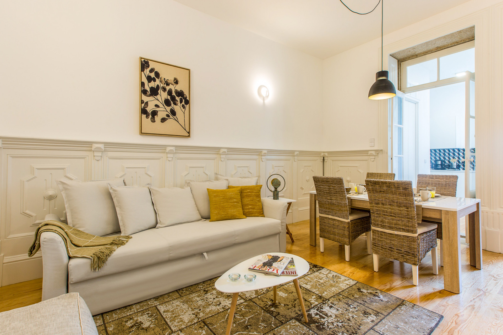 Living Room with TV, Sofa and Dining Table