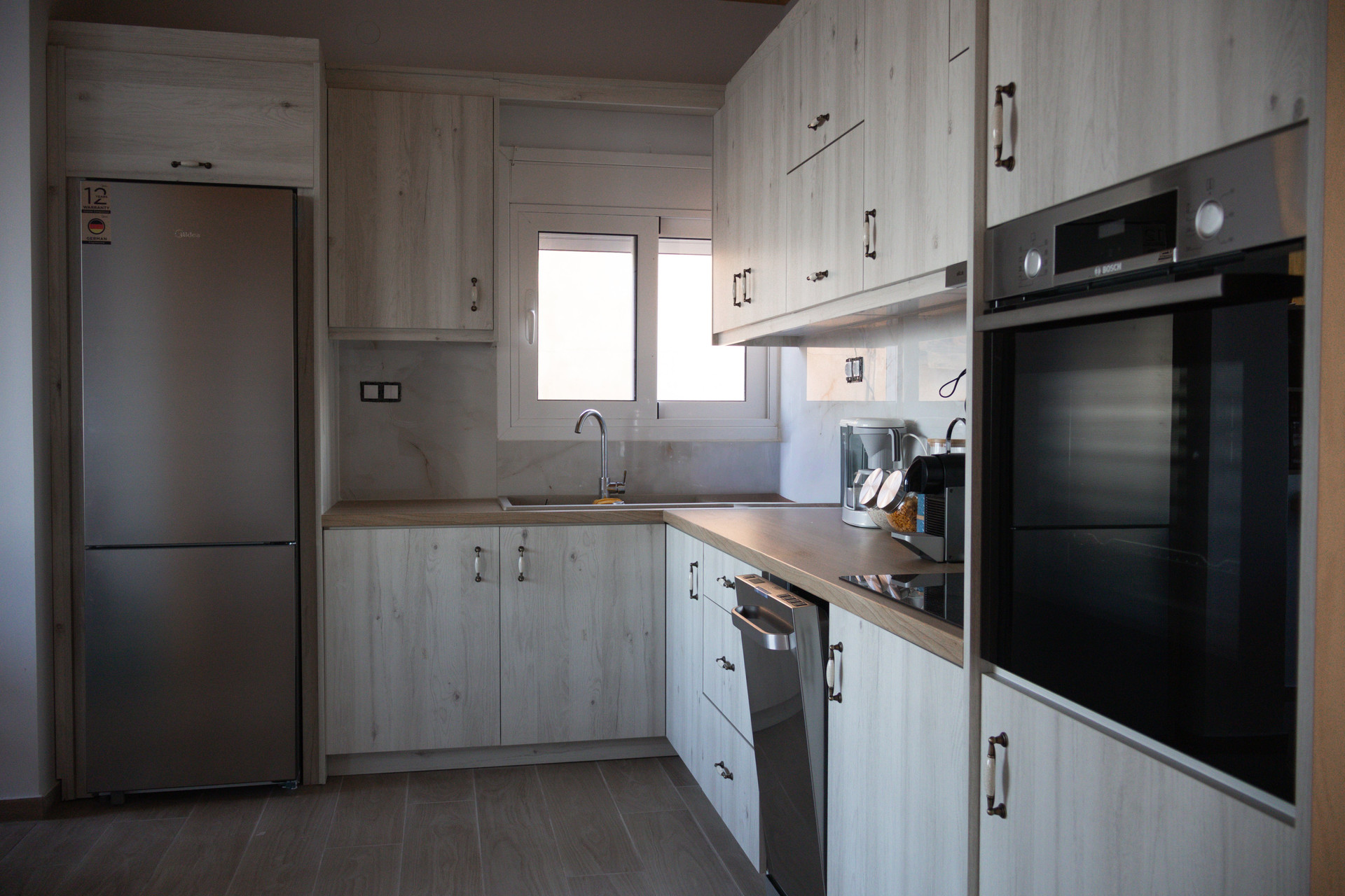 Modern kitchen with full appliances