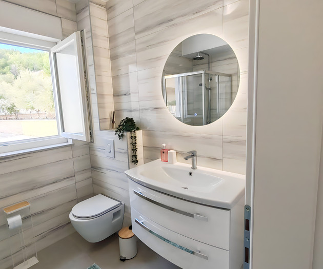 Bathroom with toilet and sink
