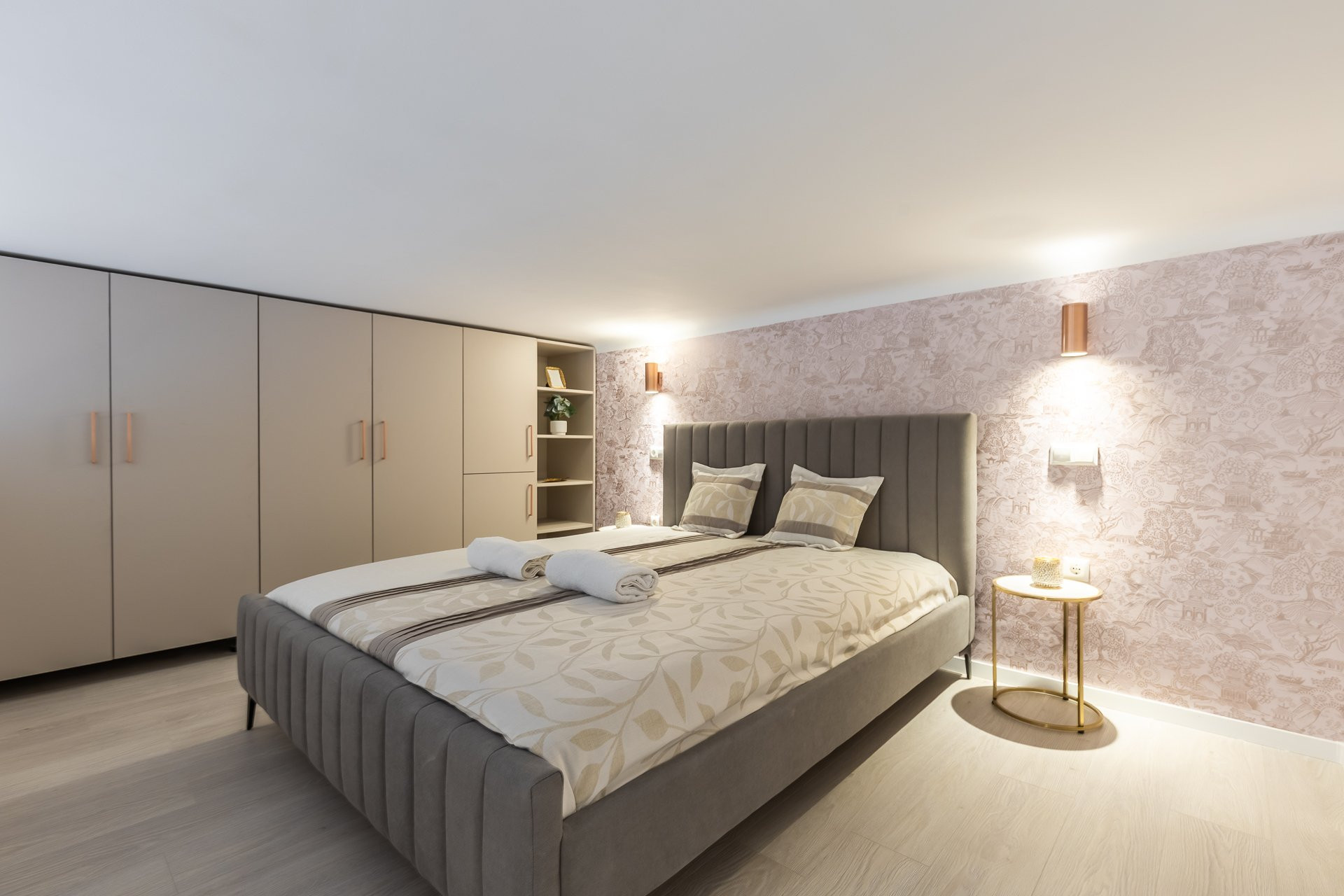 Bedroom with king bed and wardrobe