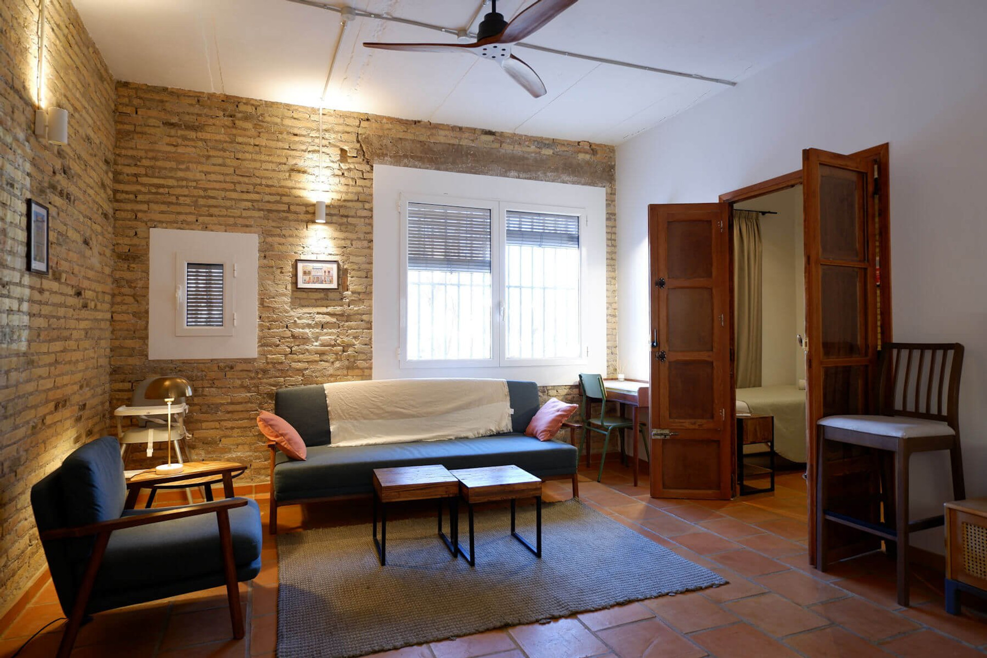 Living room with brick wall