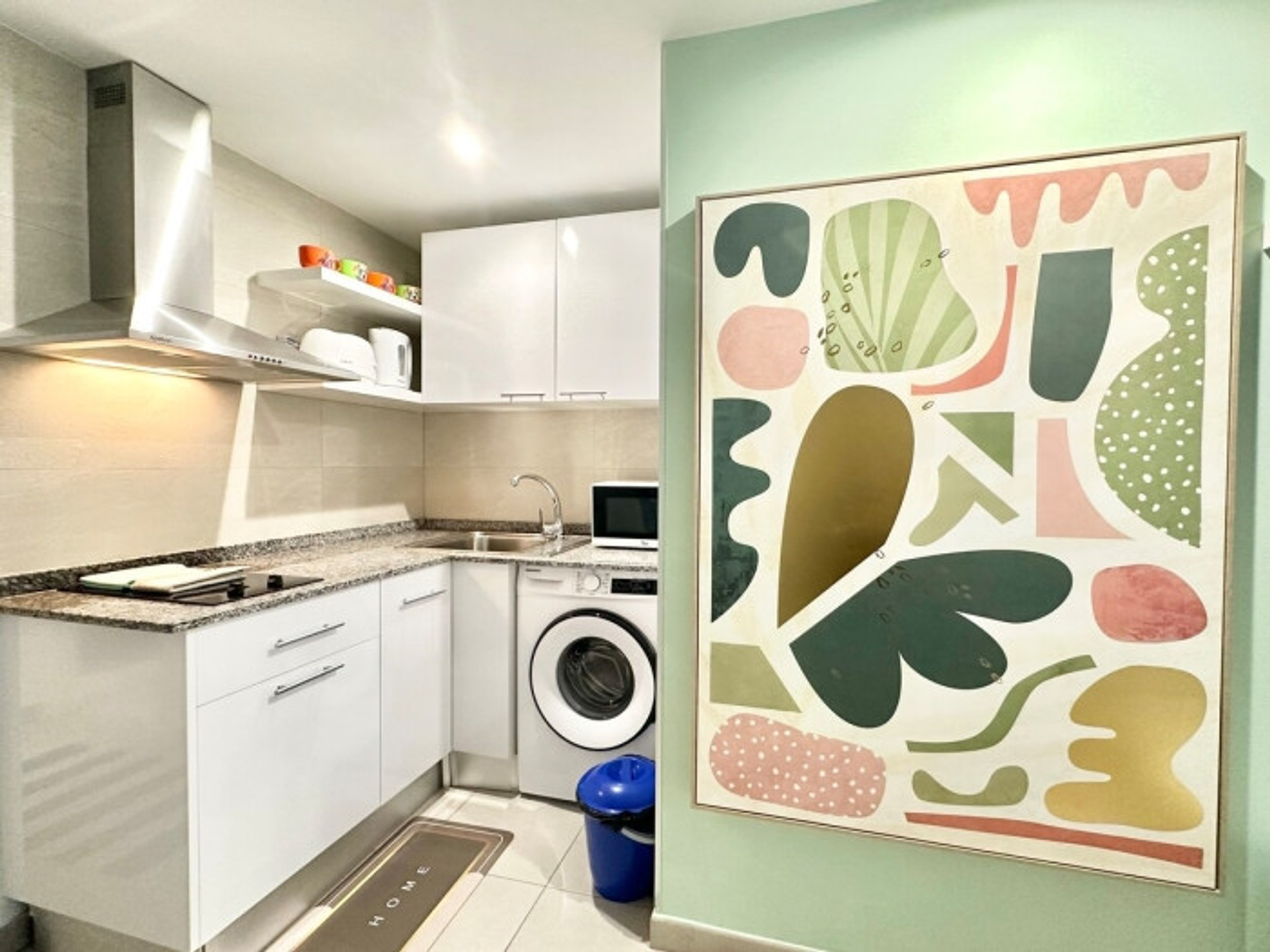 White kitchen with washing machine