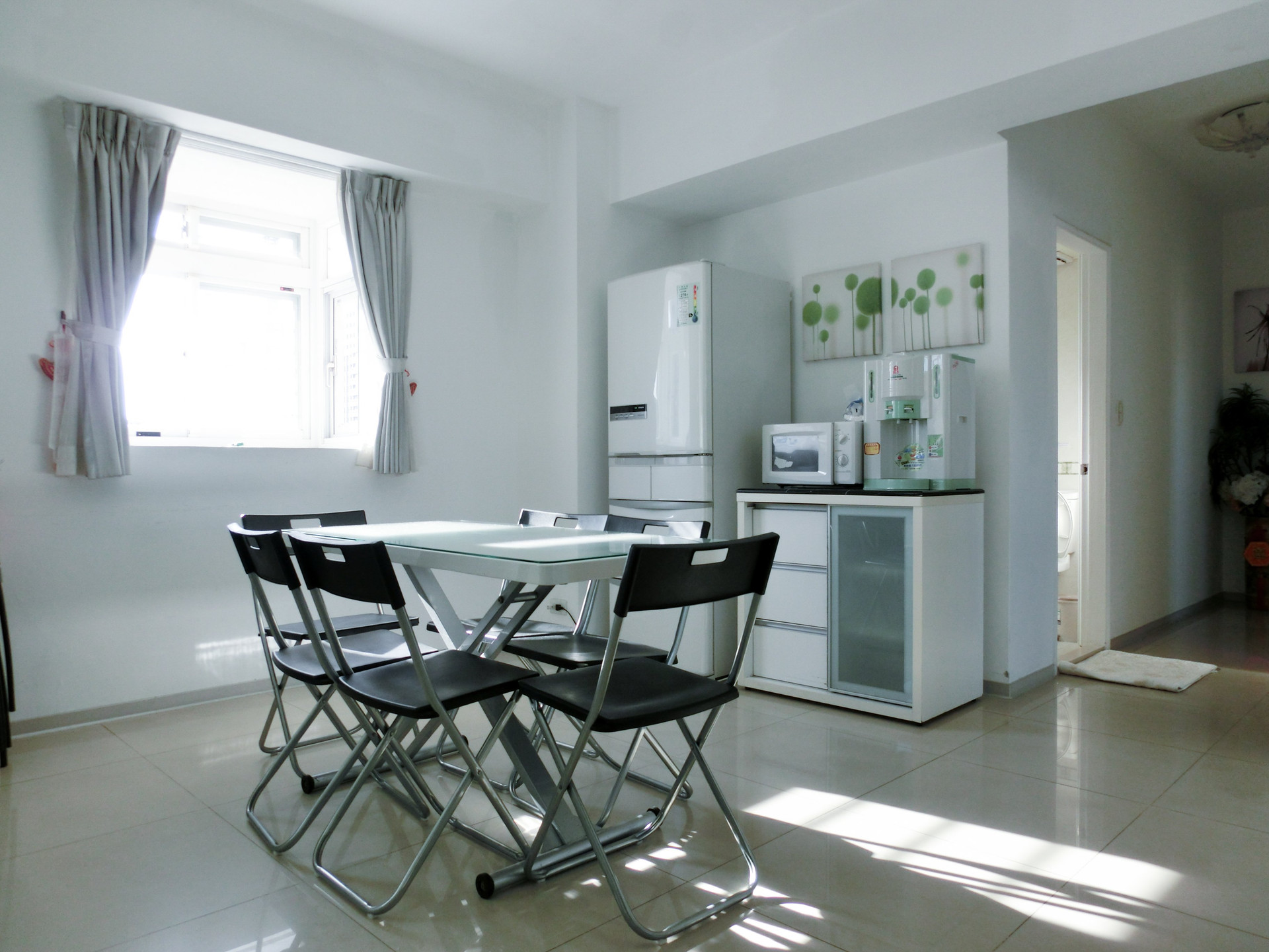 Dining area with kitchen appliances