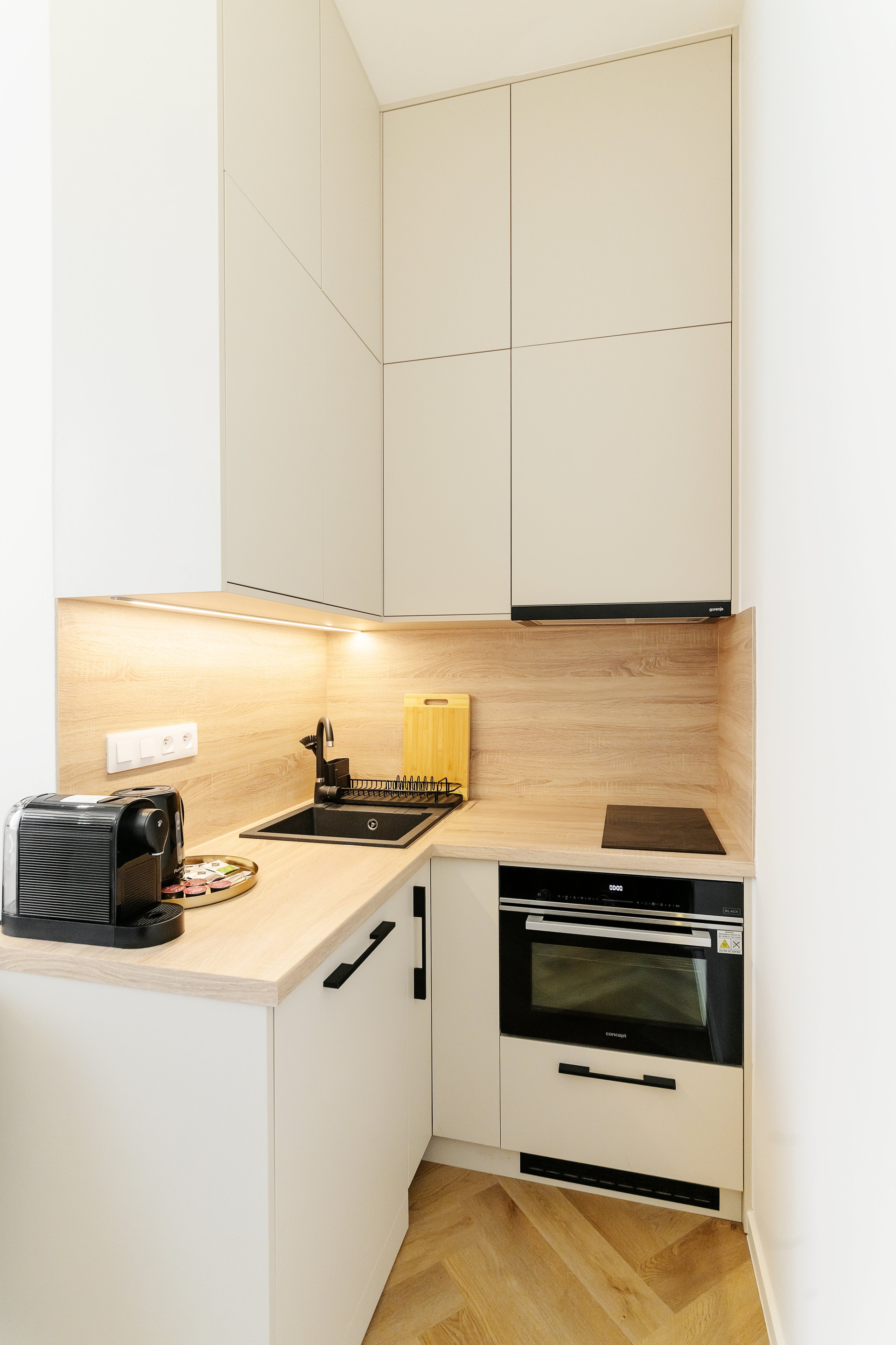 Modern kitchen with oven and cabinets