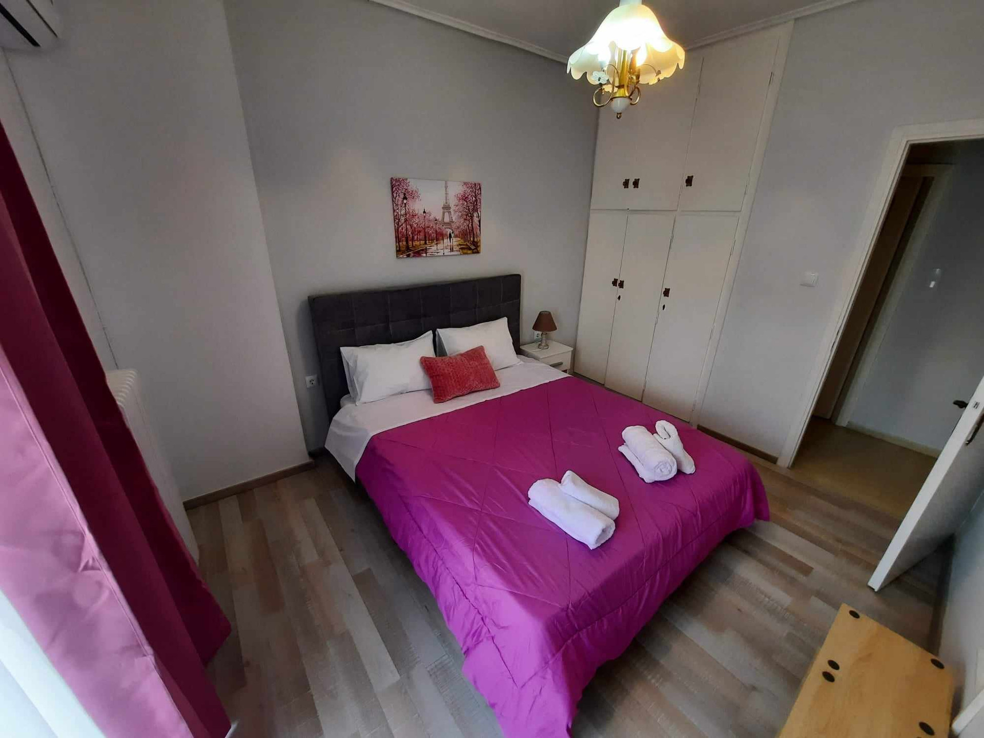 Bright bedroom with pink bedding