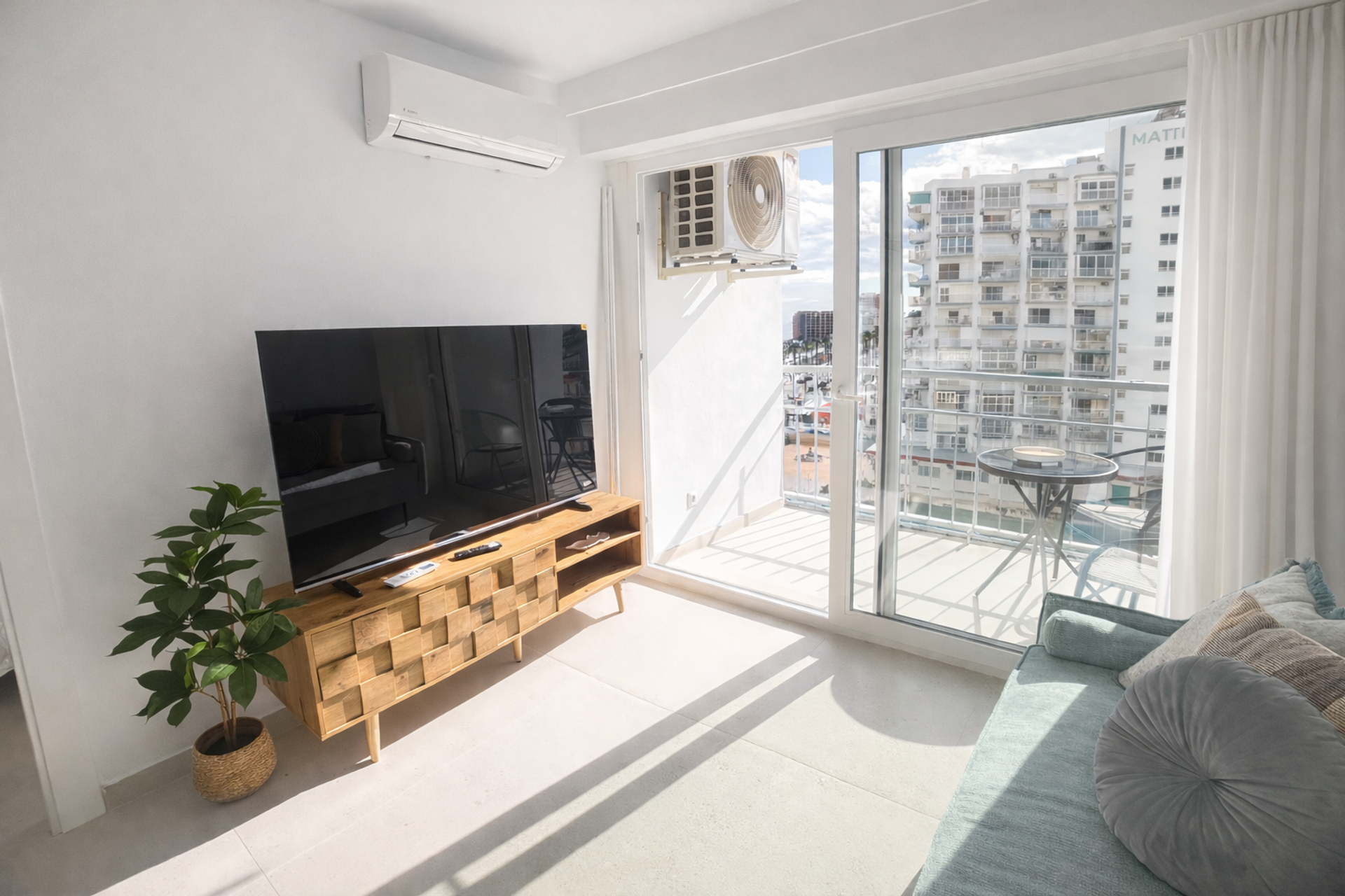 Living room TV and balcony