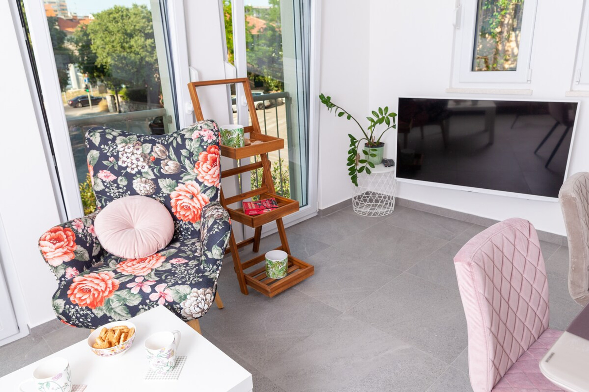 Living room with French balcony. 