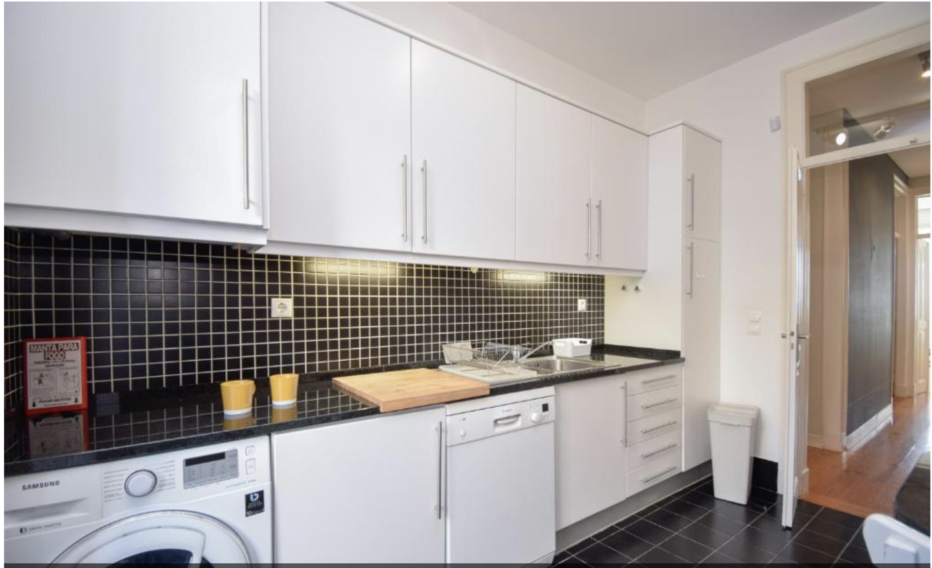 Kitchen with washer dryer
