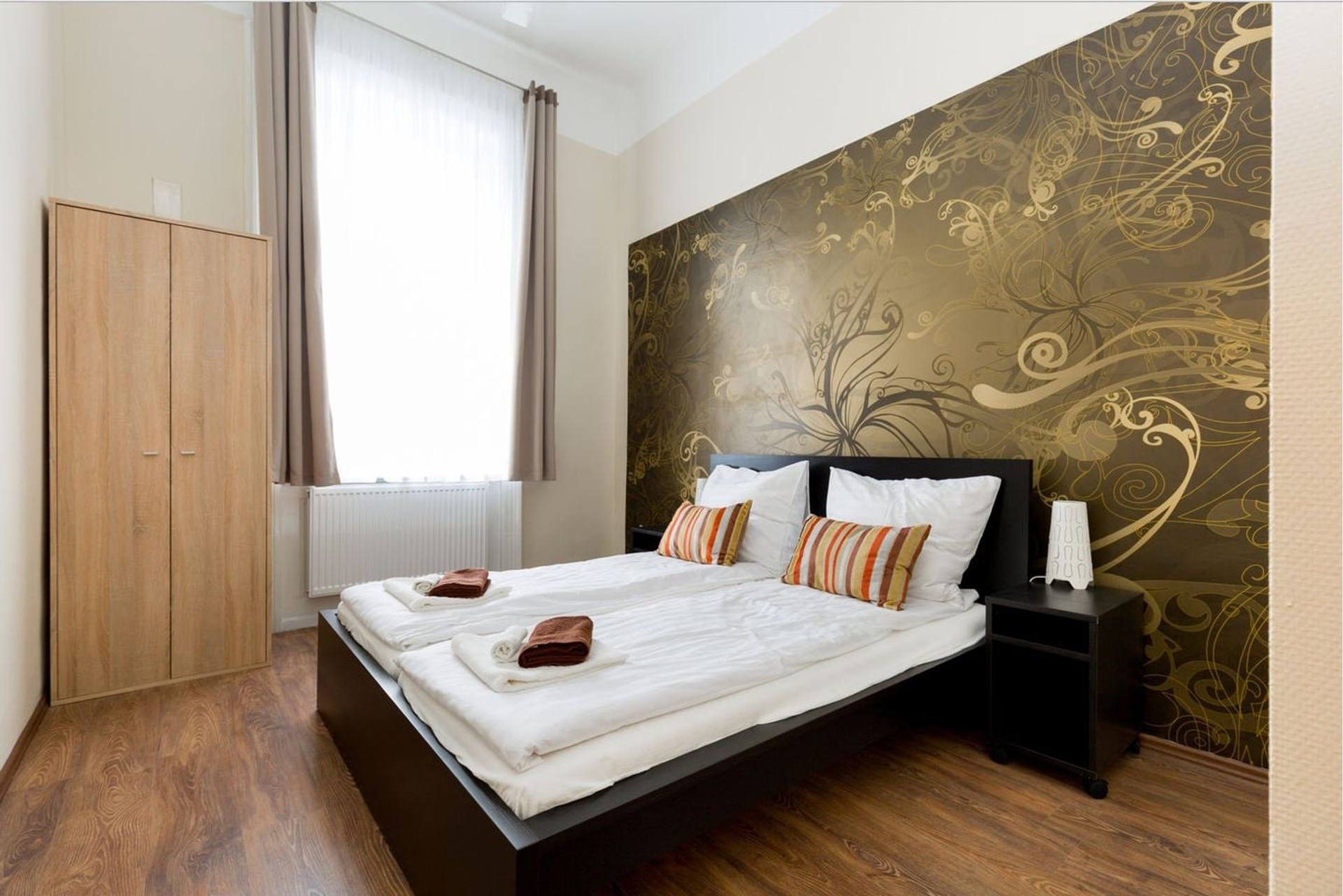Double bedroom wide gold mural view