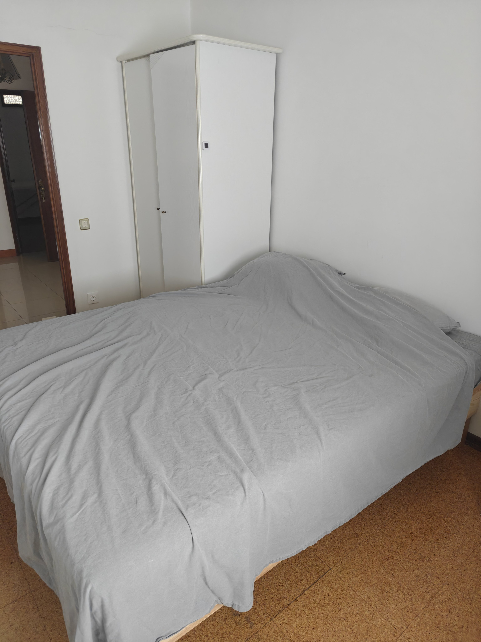 Bedroom with wardrobe and bed