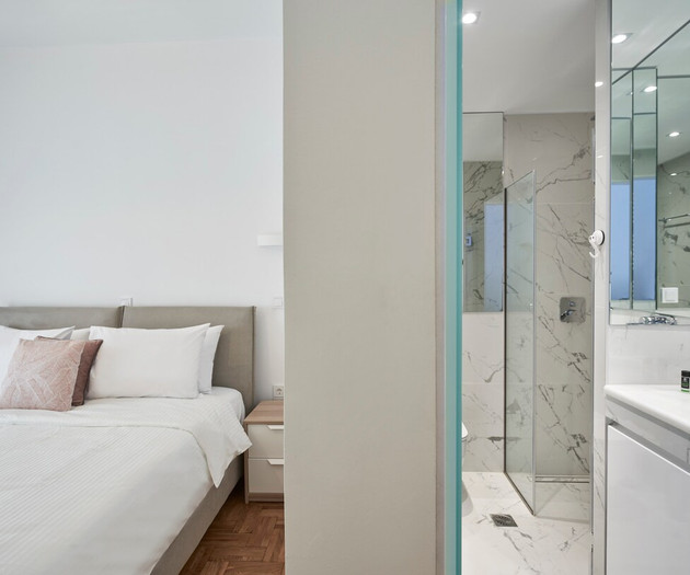 The first bedroom and the bathroom