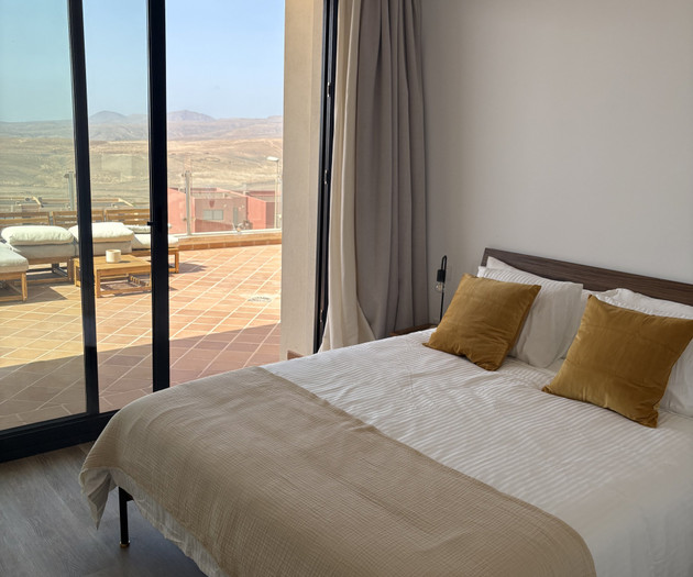 Bedroom with balcony access
