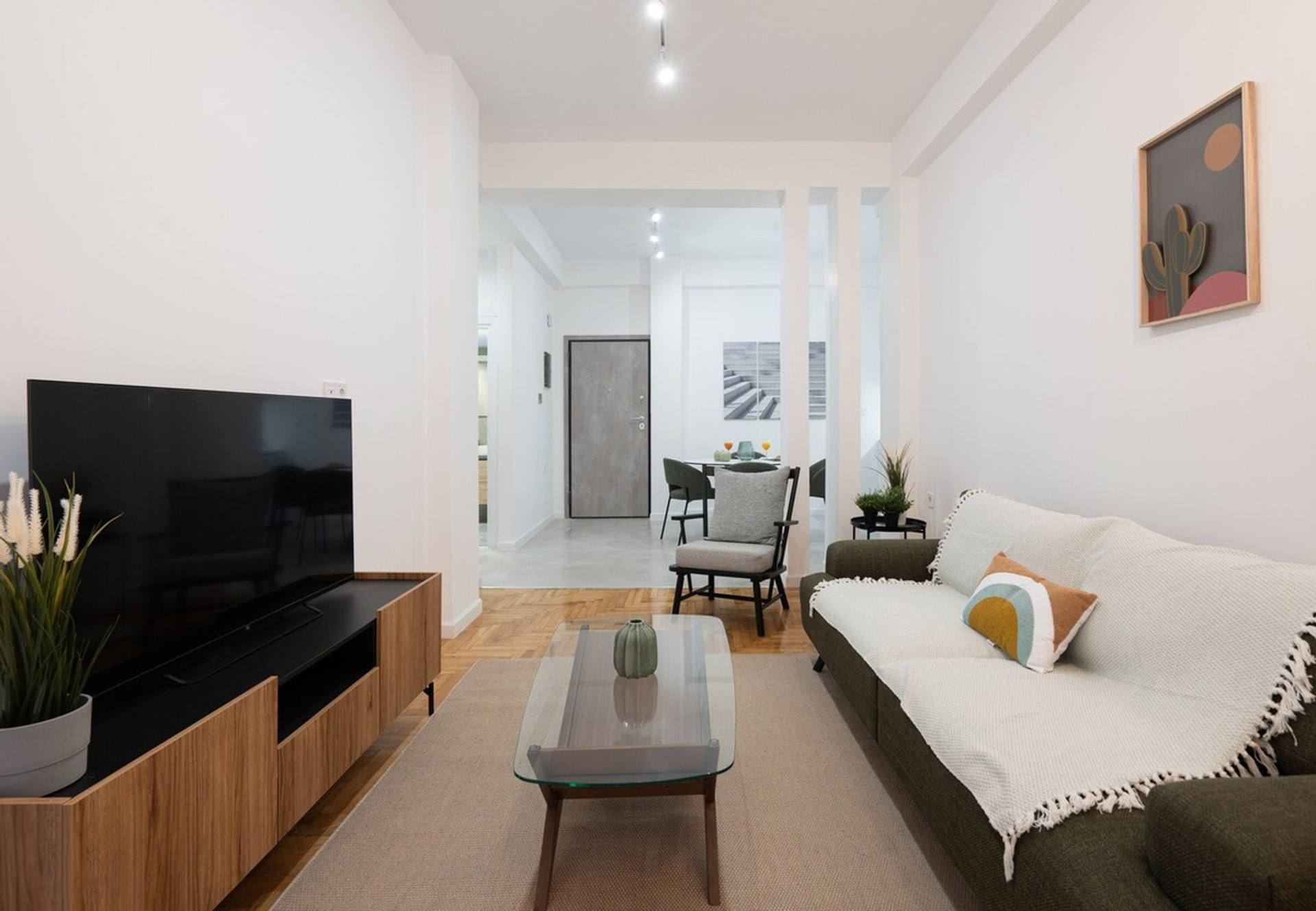 Make yourself comfortable in this spacious living room 