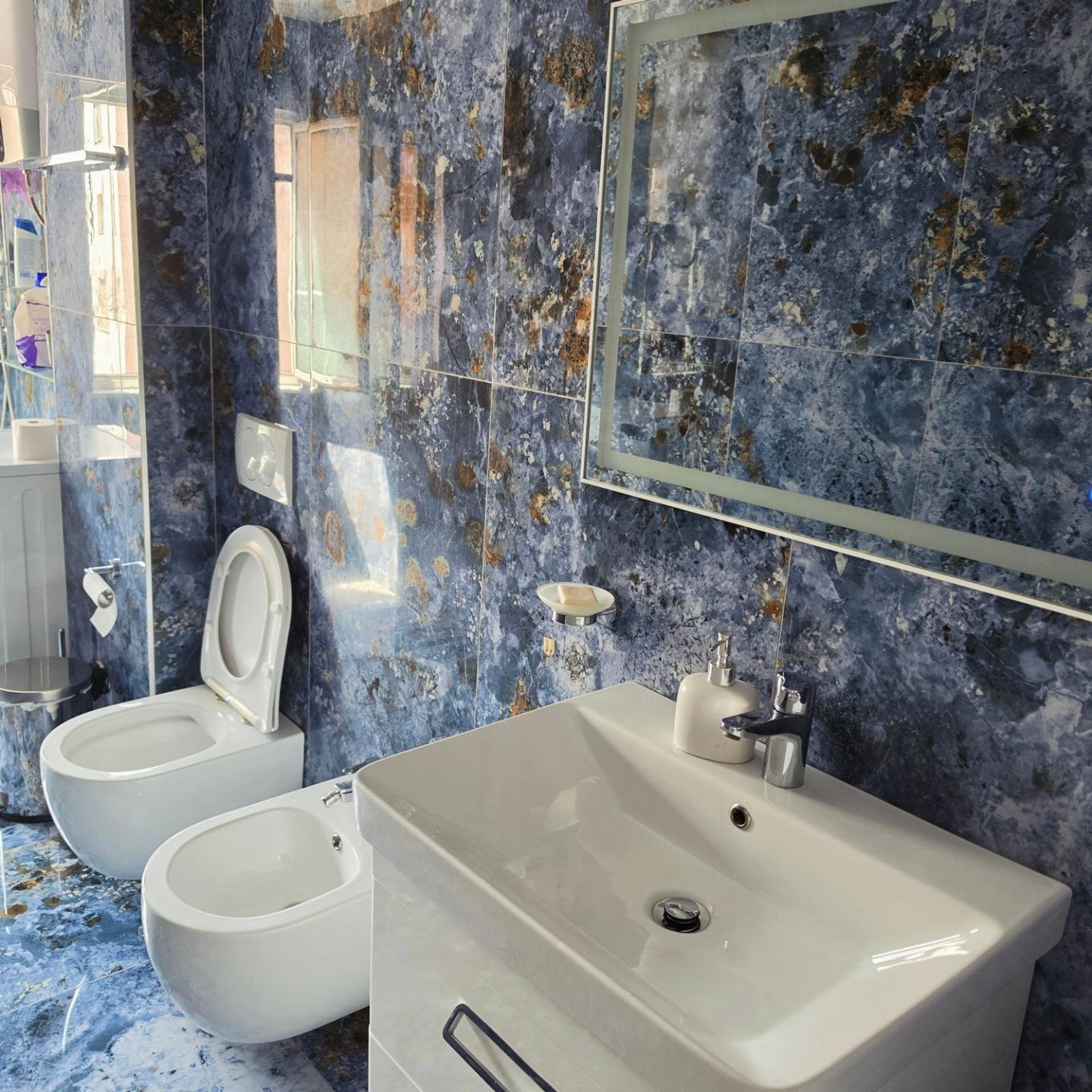 Bathroom with sink and toilet