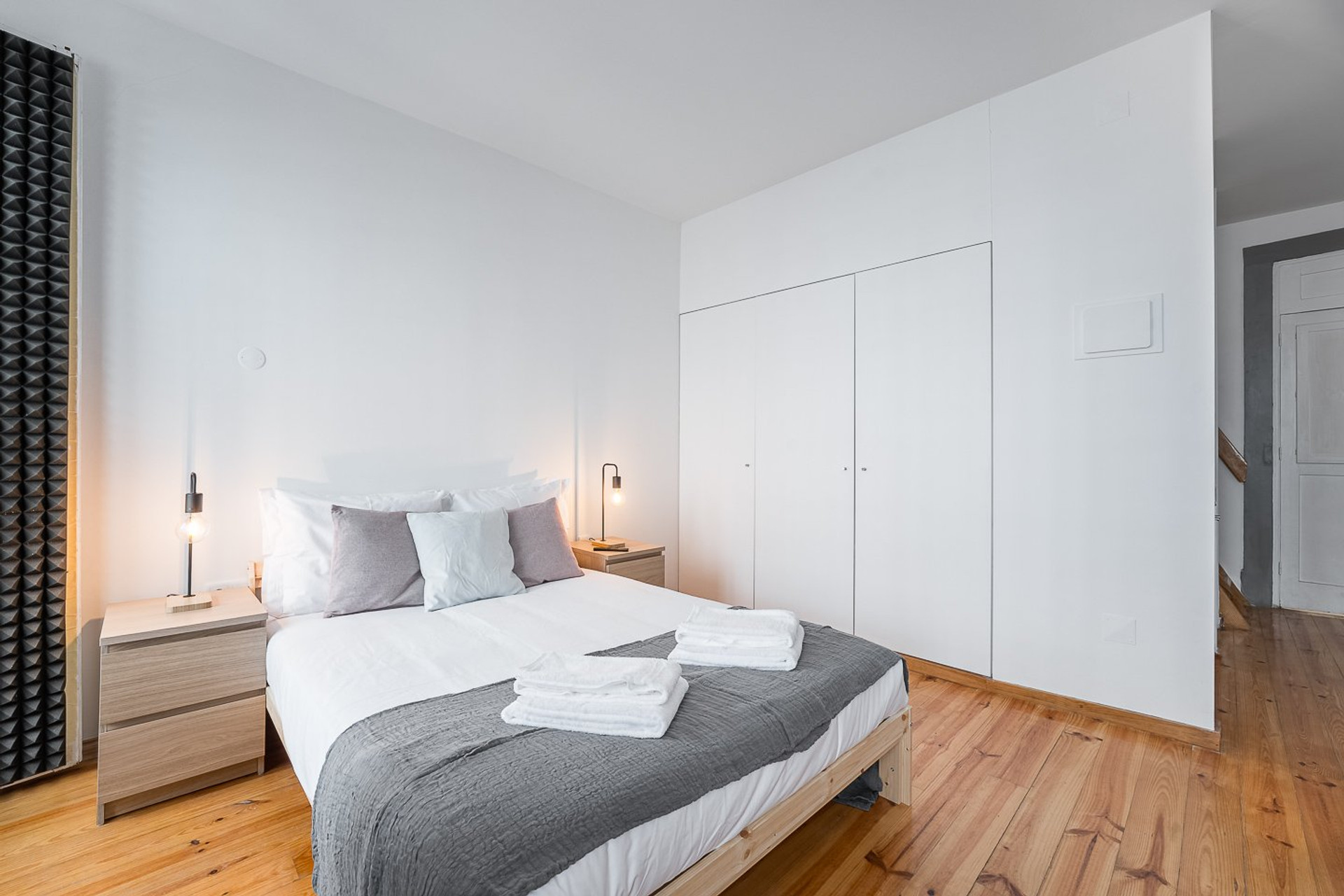Bedroom with wardrobe and lamps