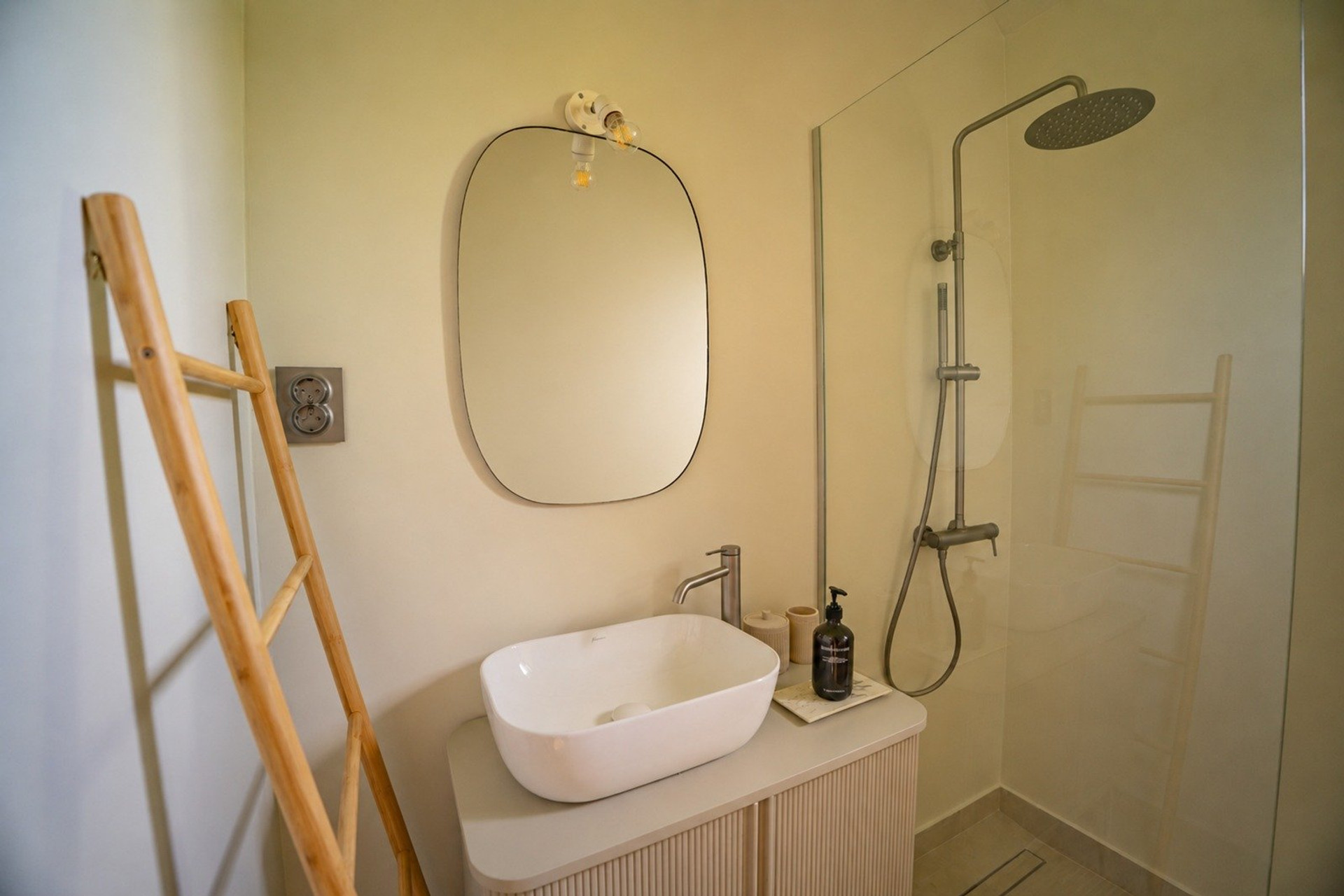 Bathroom with vessel sink and shower