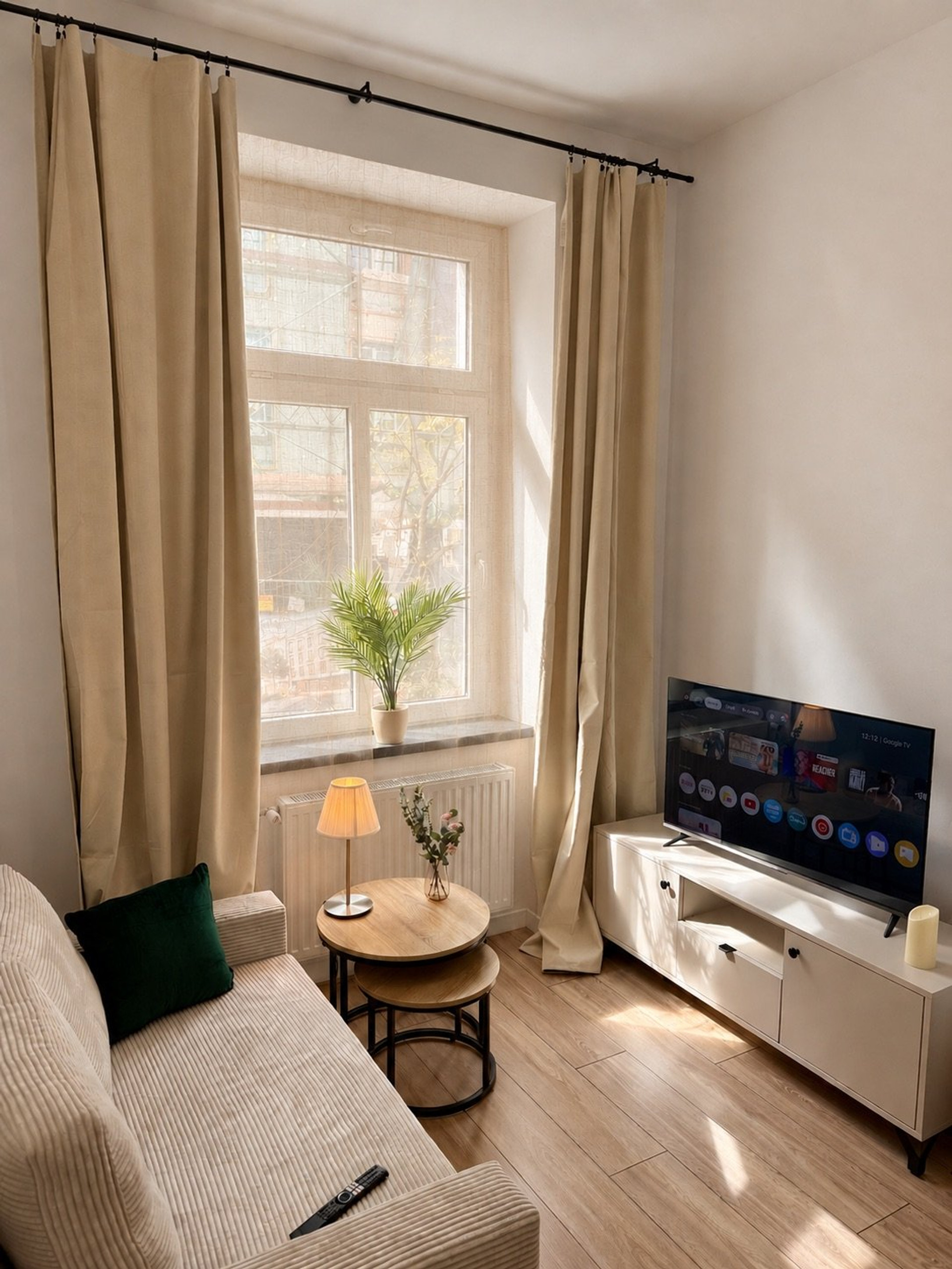 Cozy living room with TV and sofa