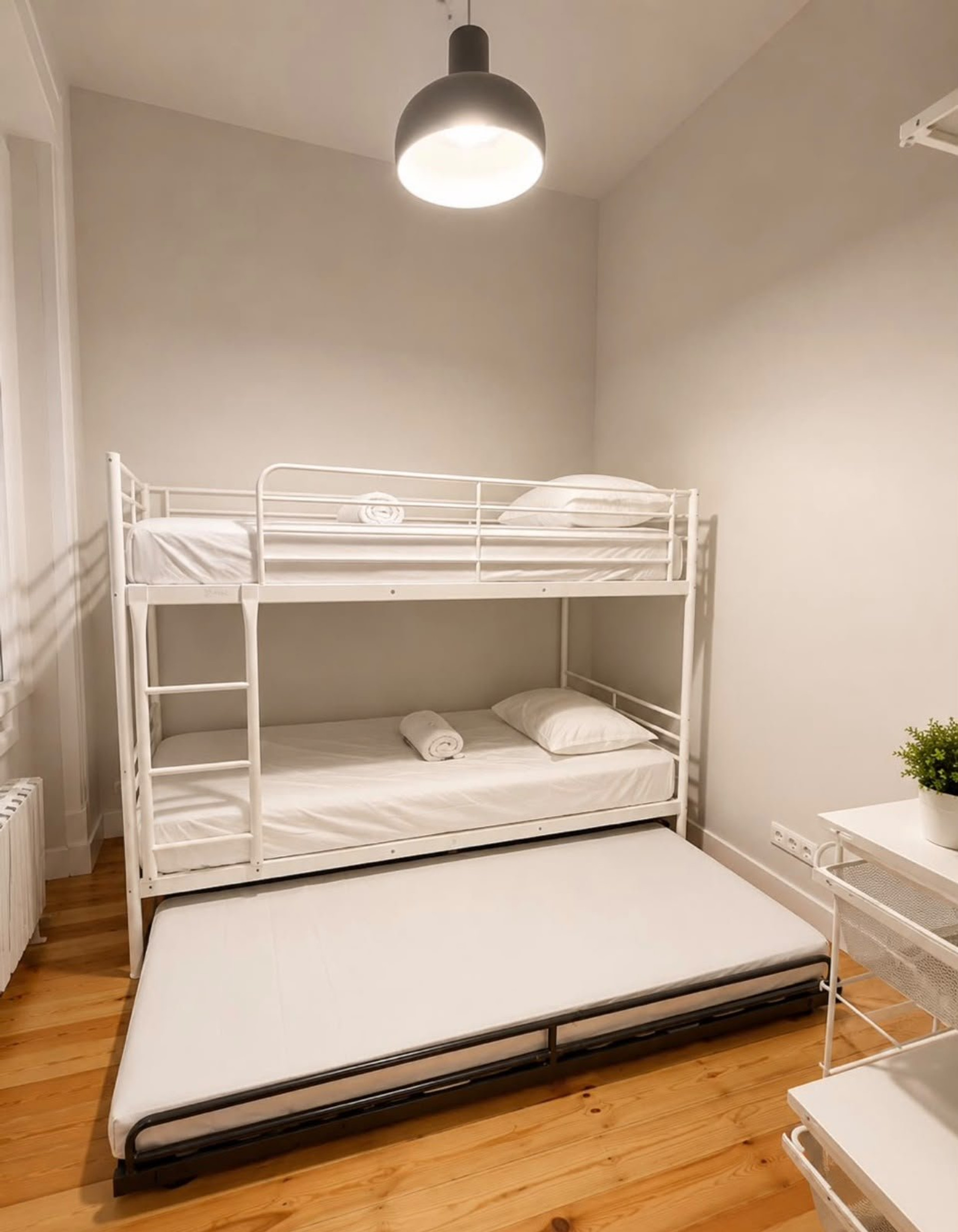 Bedroom with bunk and trundle beds