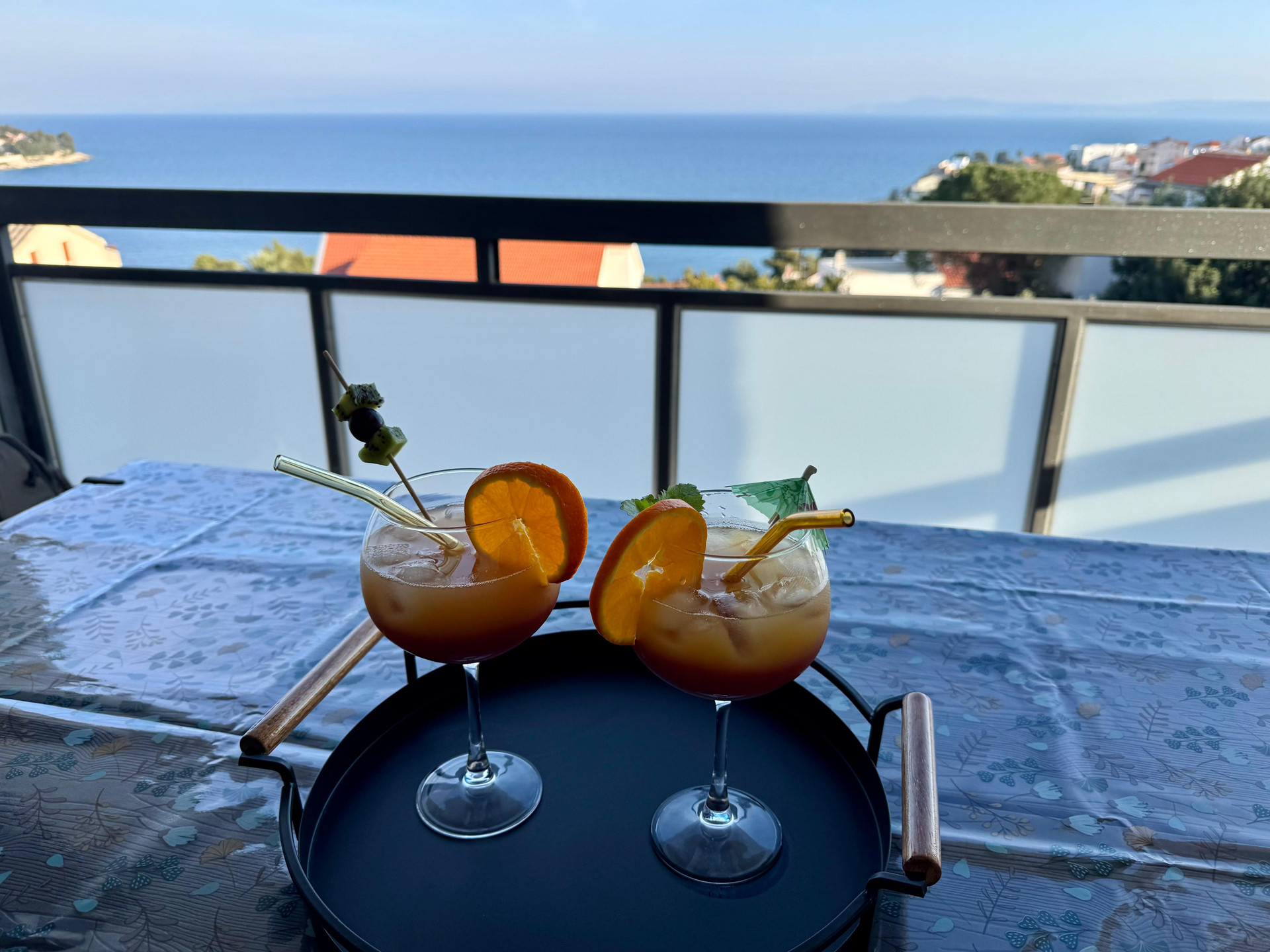 Cocktails on balcony sea view