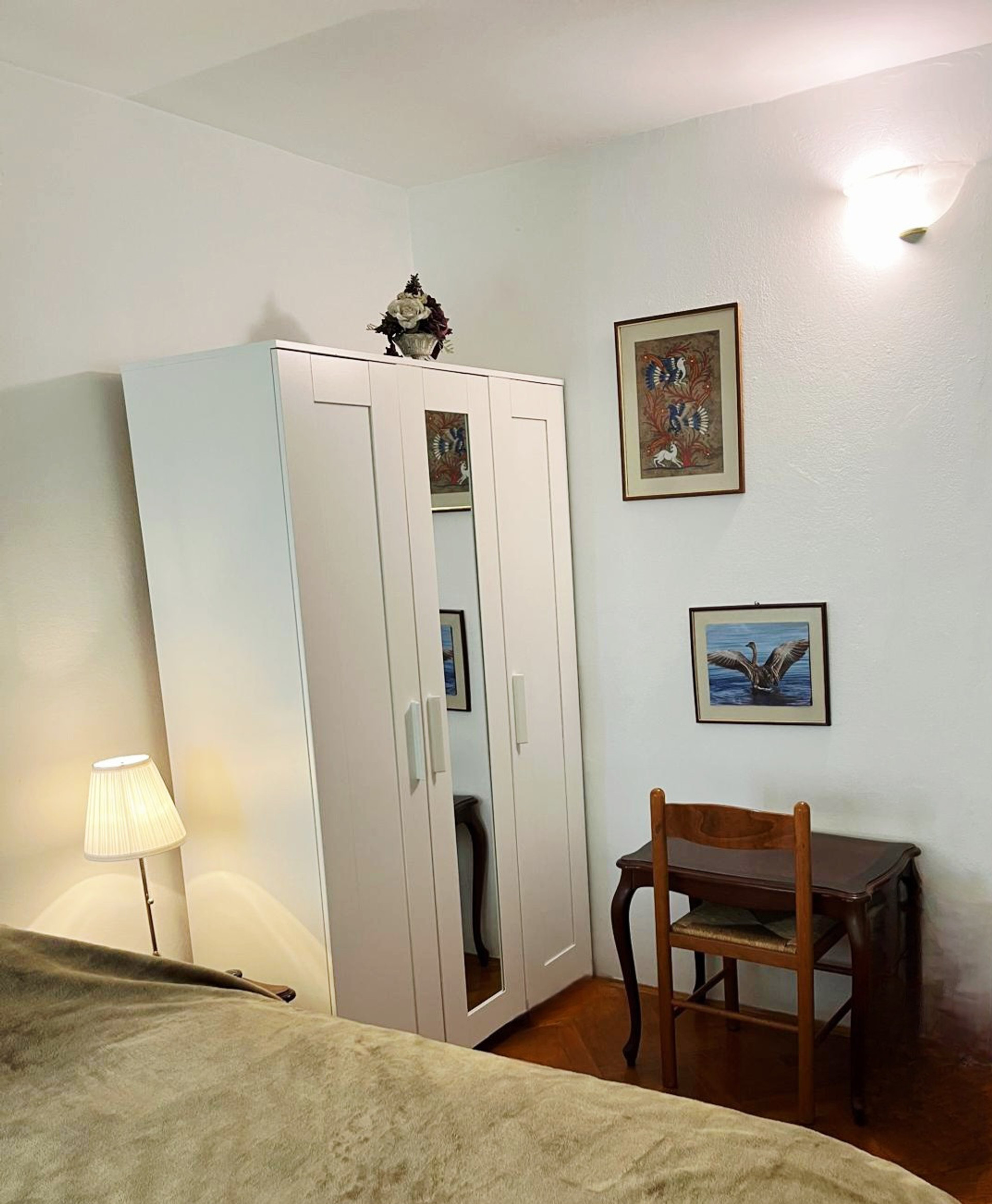 Large cabinet for clothes and a small desk