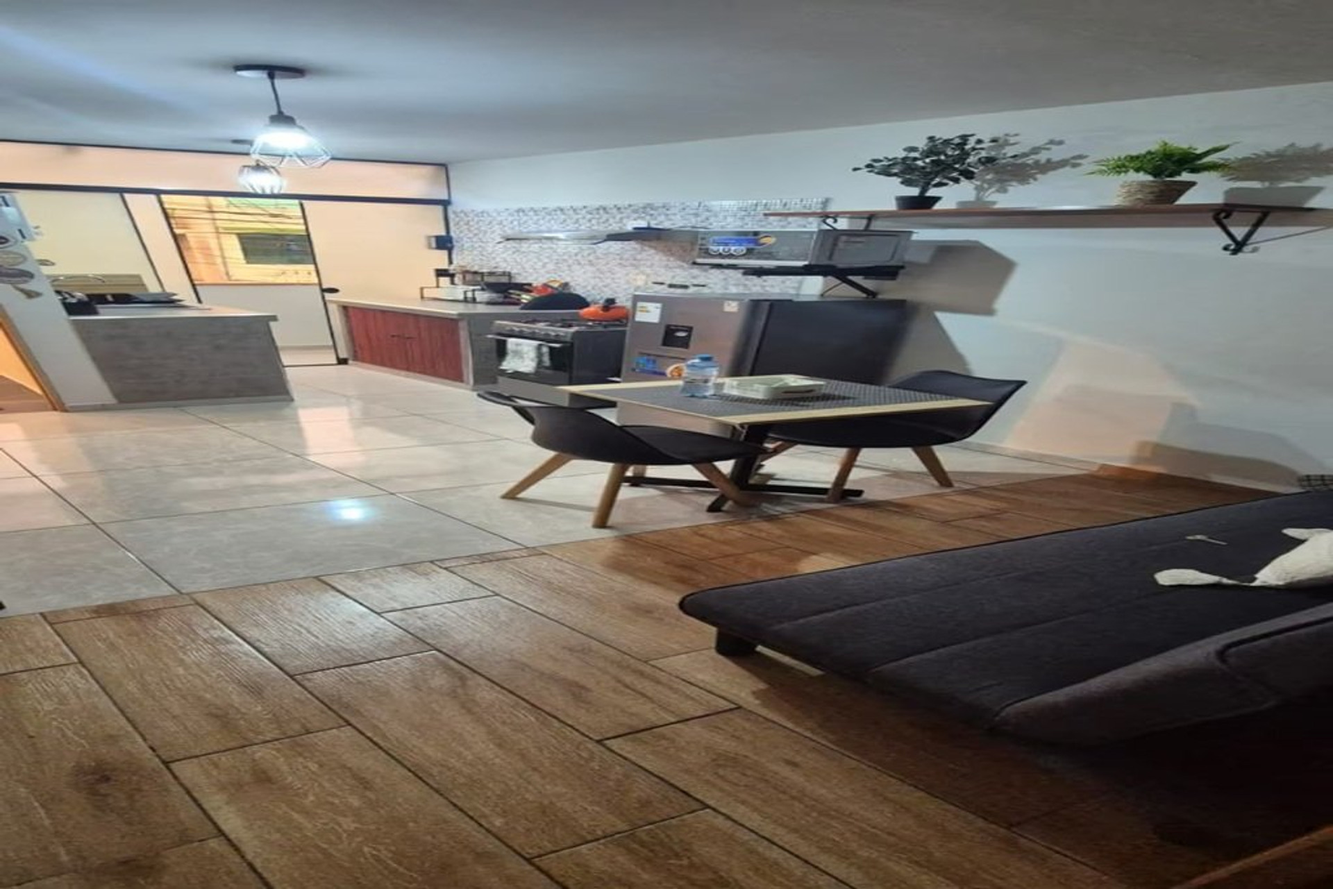 Open living area with kitchen