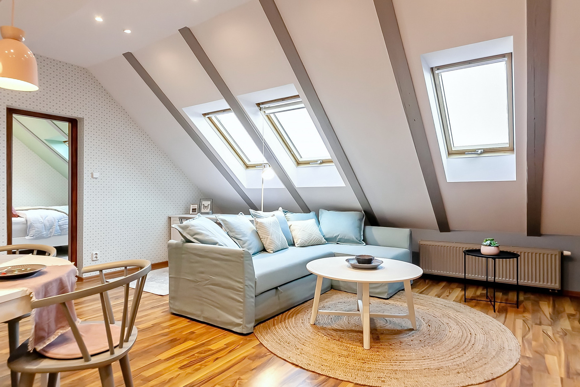 Bright attic living room with skylights