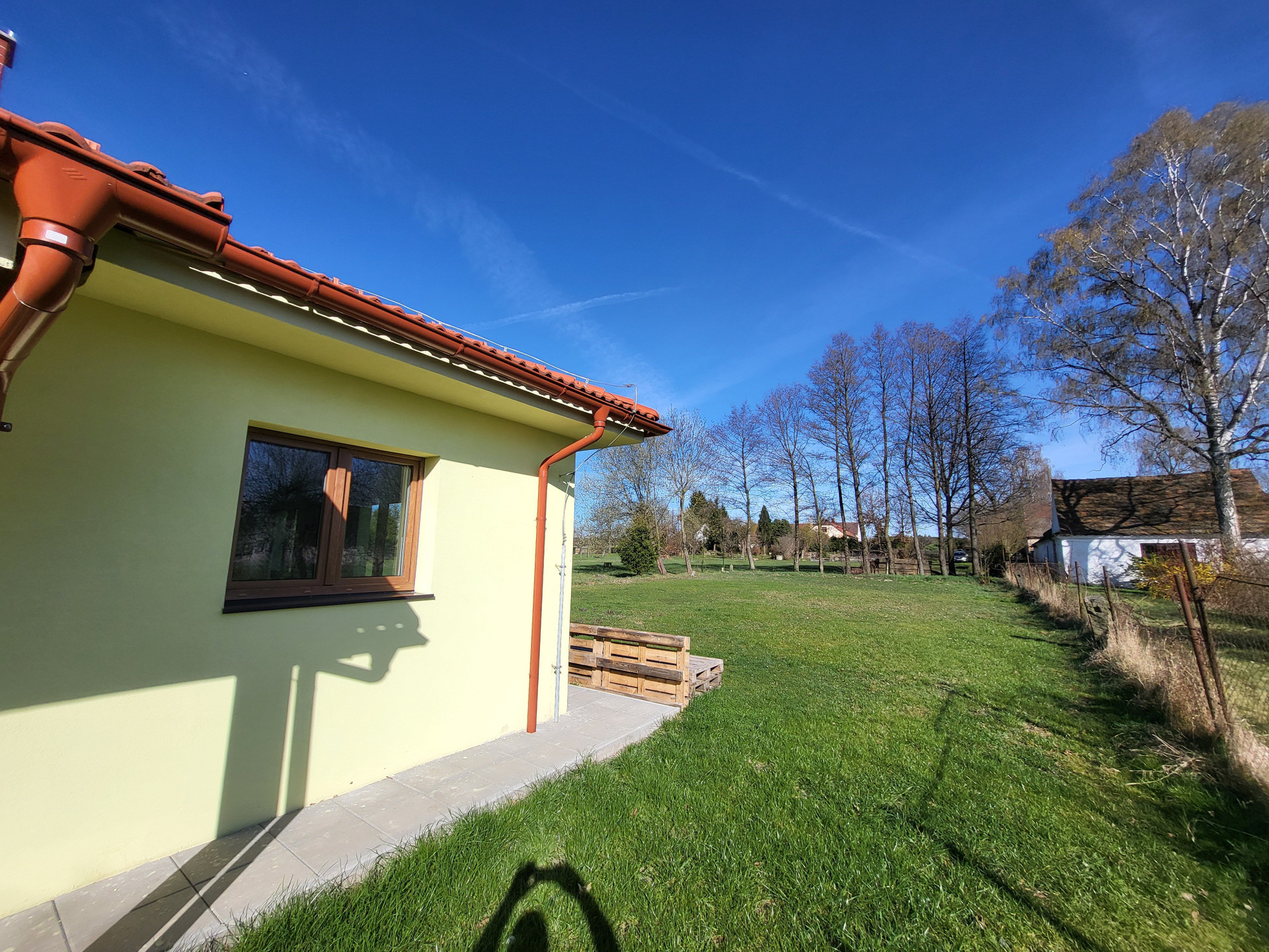 House exterior with garden and terrace