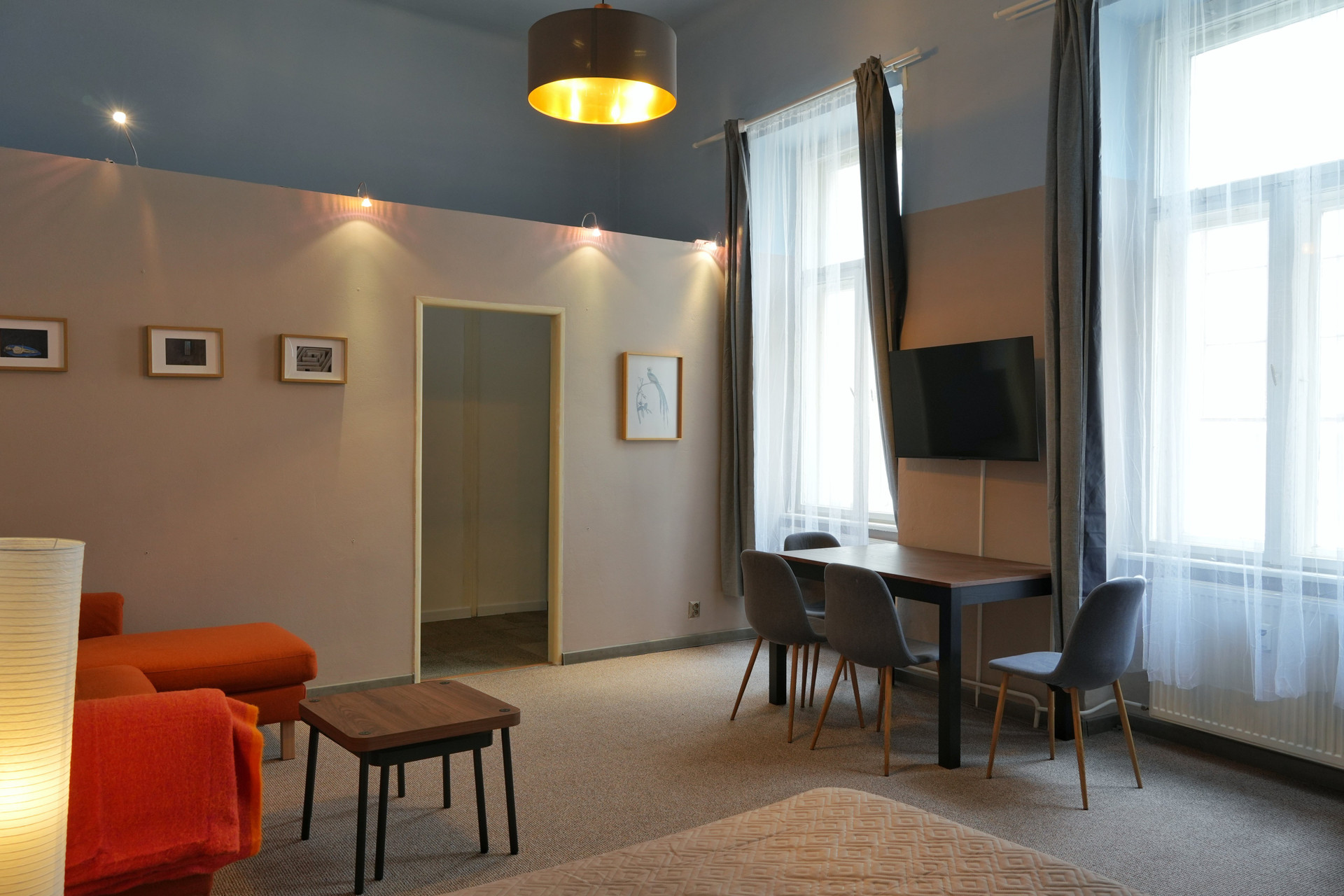 Living space with TV and dining table