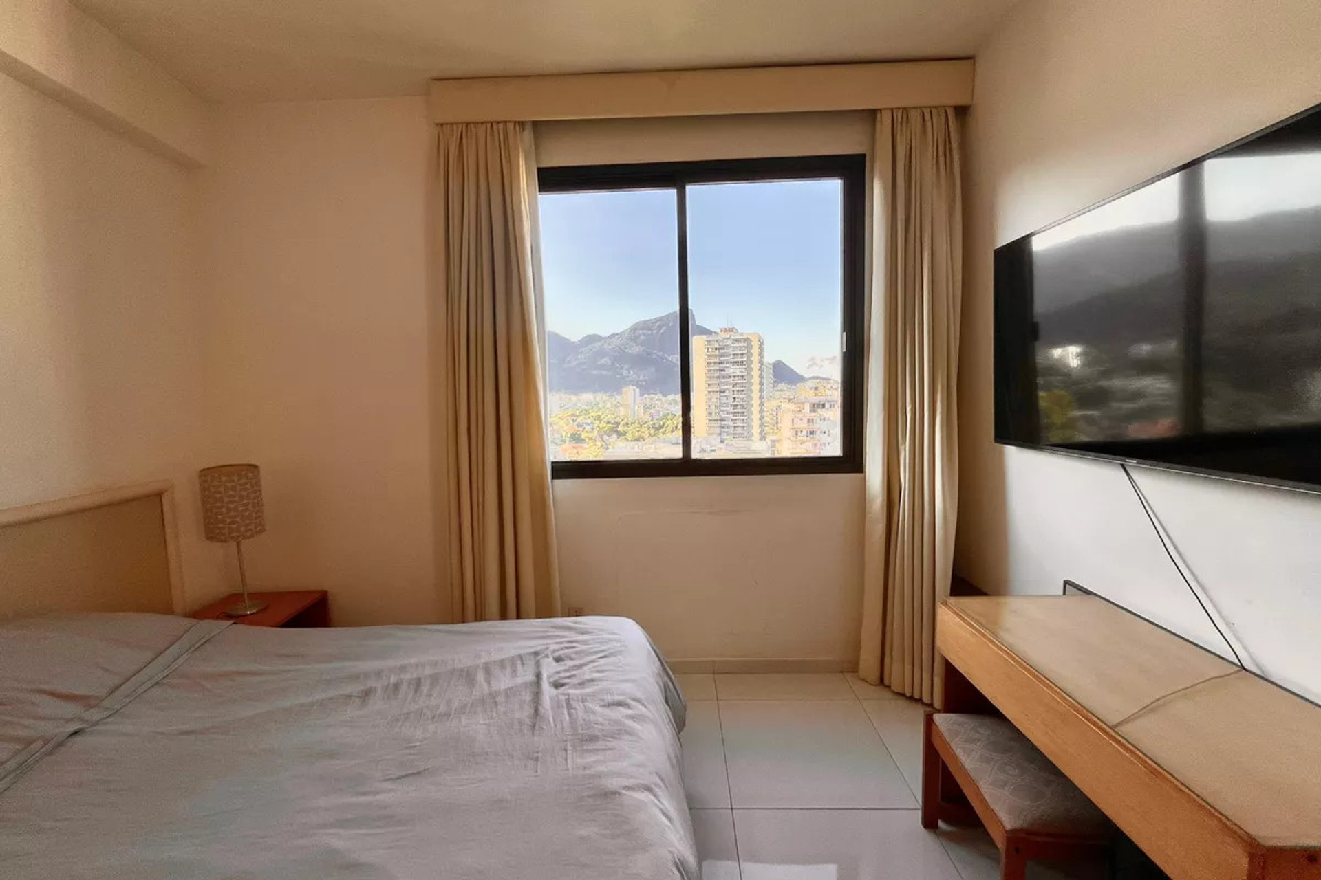 Bedroom with mountain view and TV