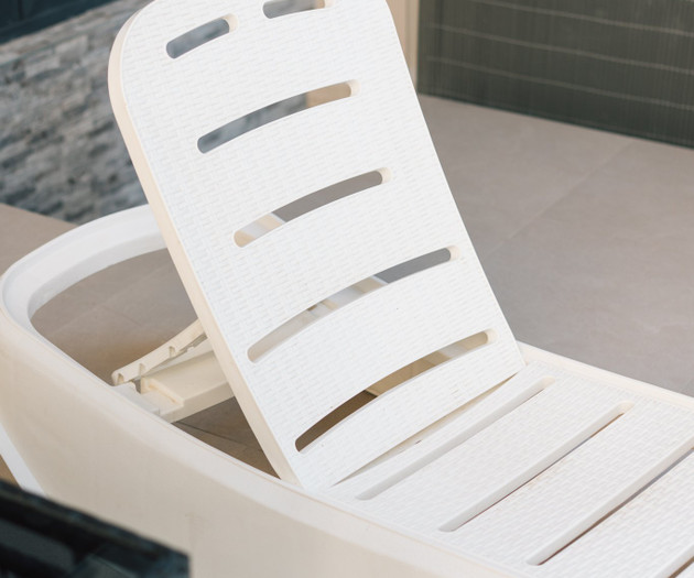 White sun lounger on terrace