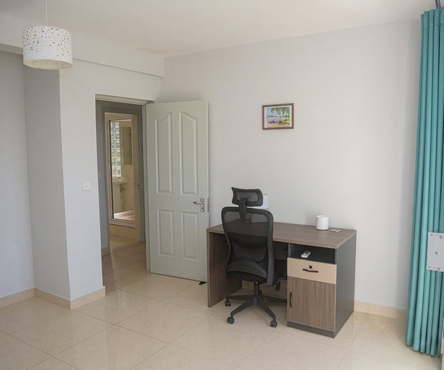 Bedroom with desk area