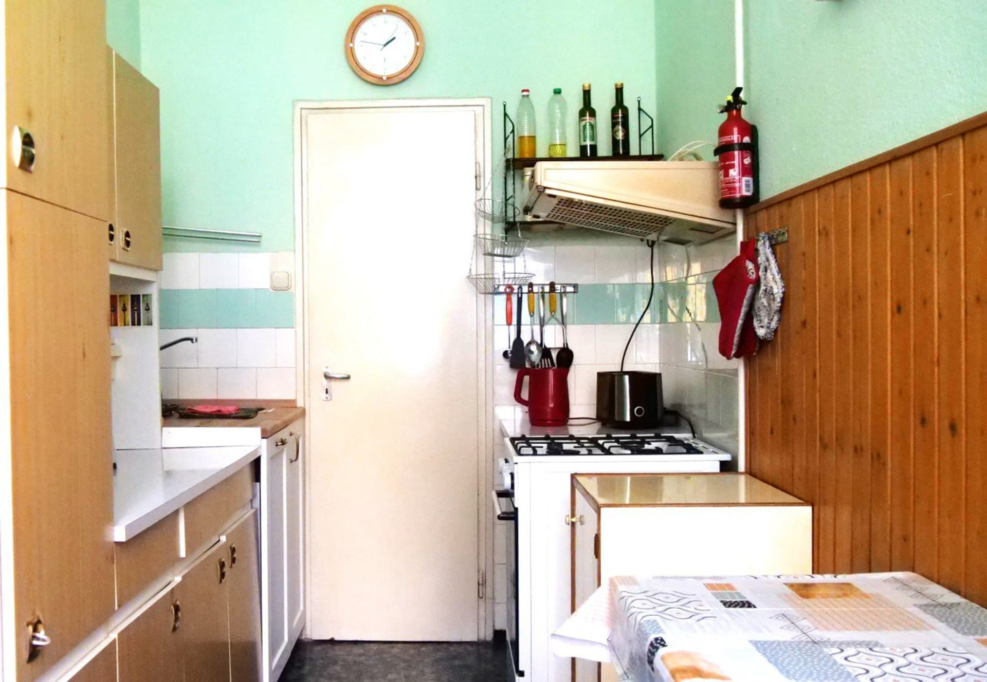 Kitchen with stove and cabinets