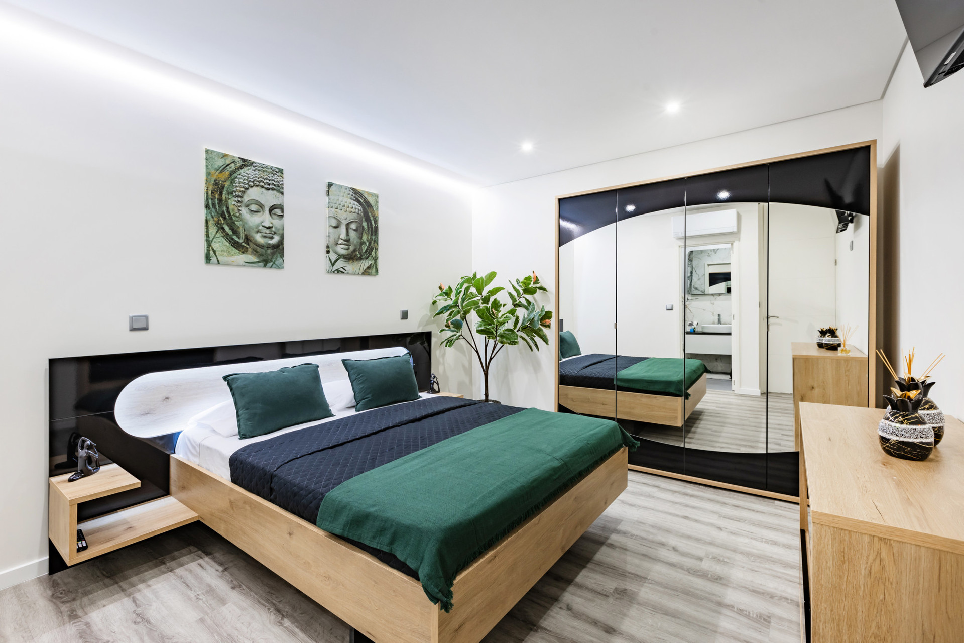 Bedroom with Queen-Sized Bed, AC and en suite bathroom. This in an interior room (no windows).
