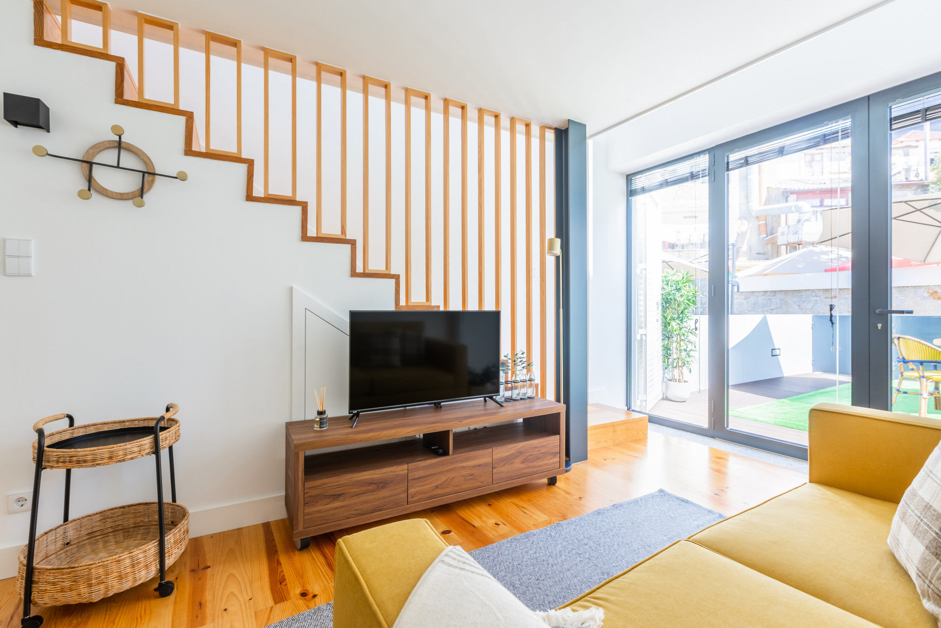 Living Room with A/C and Flat-Screen TV