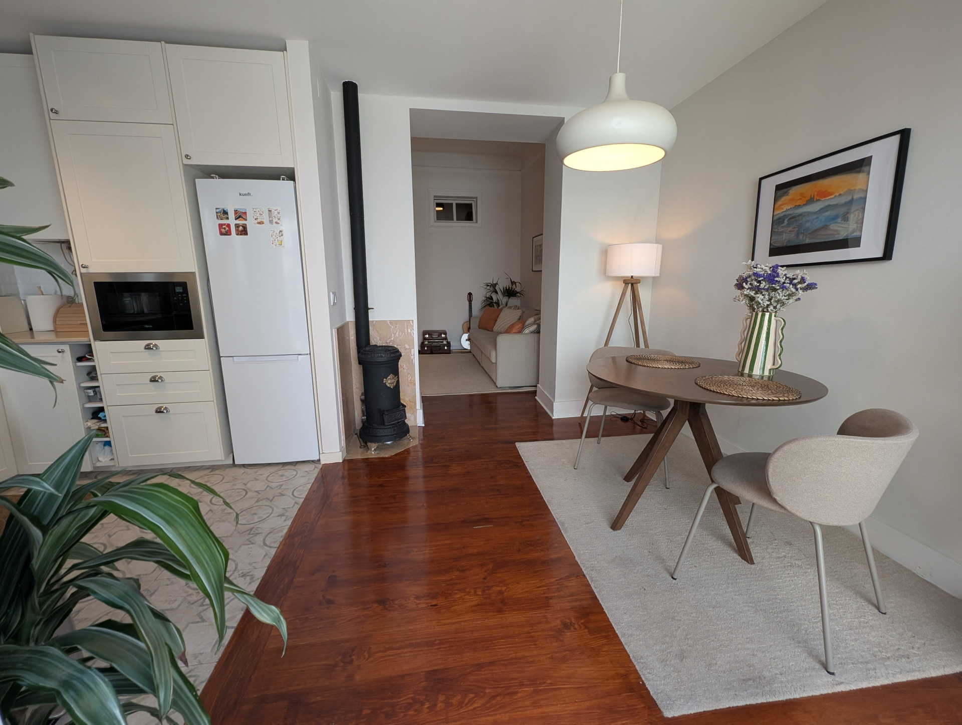 Dining area with kitchen and living room