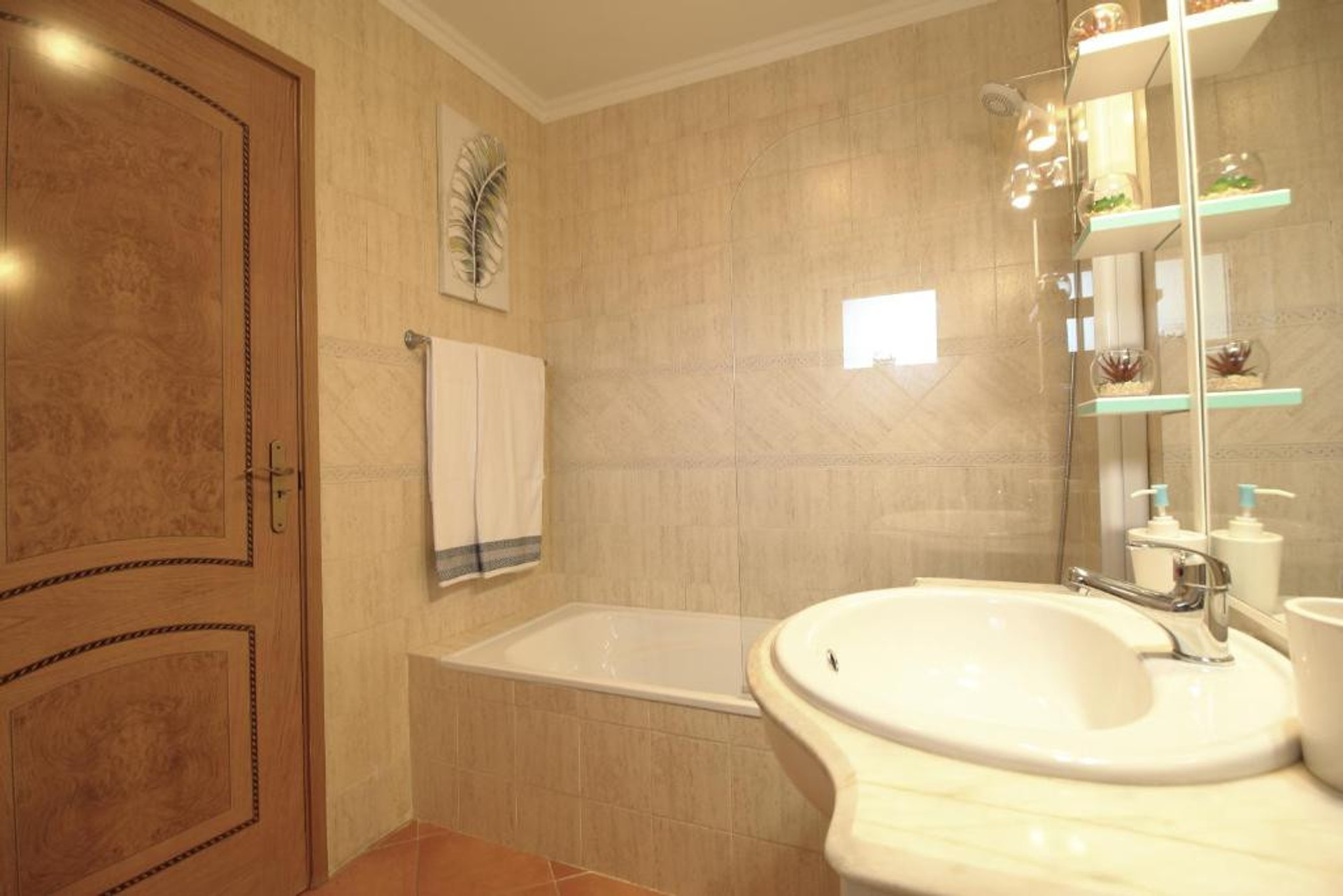 Bathroom with bathtub and sink