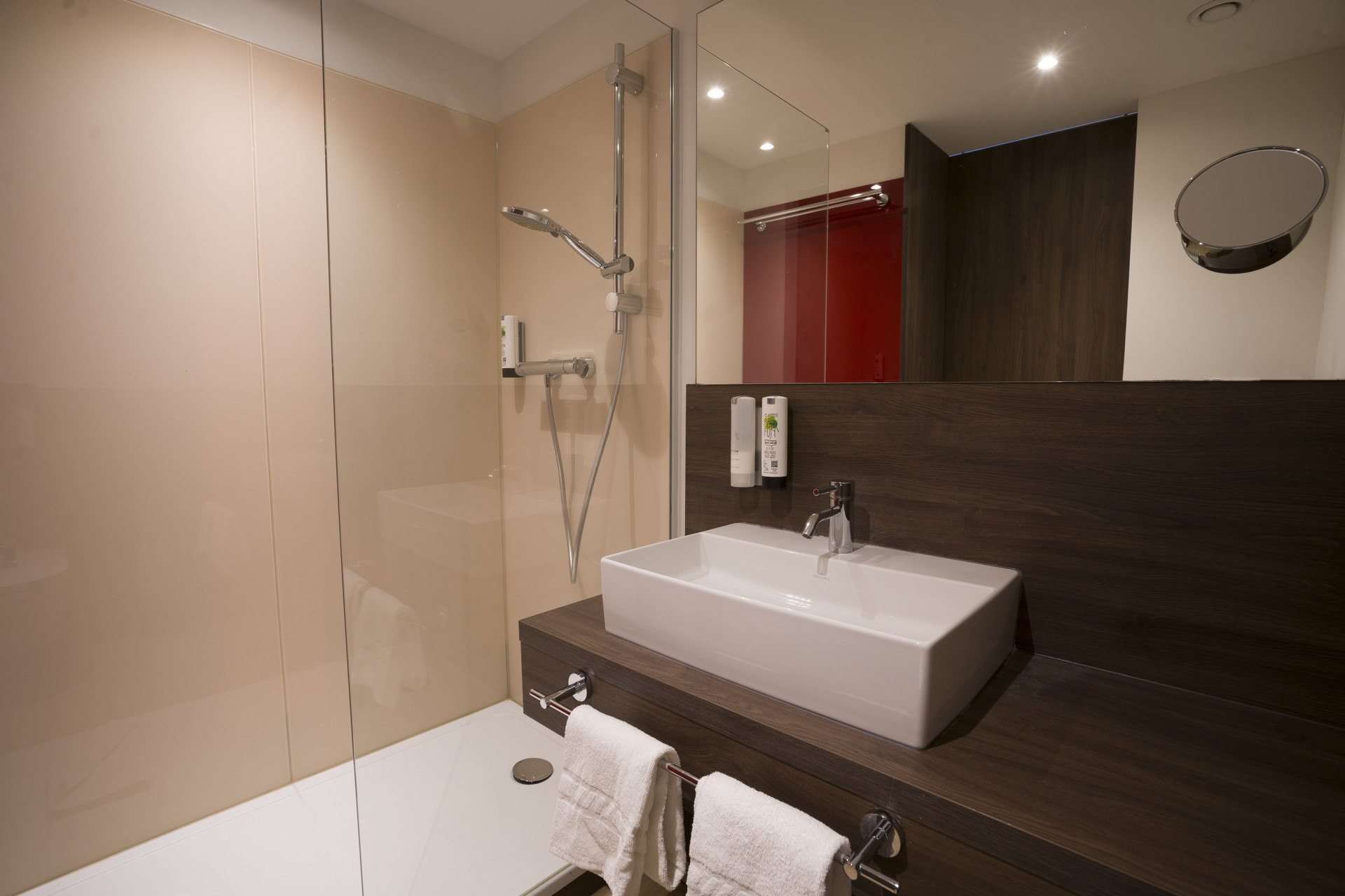 Bathroom with shower and vanity sink