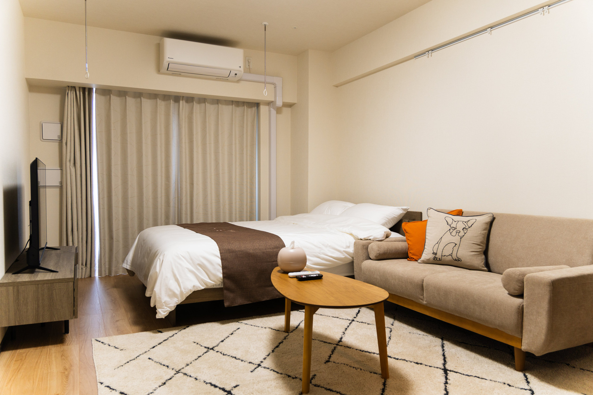 Studio room with bed and sofa