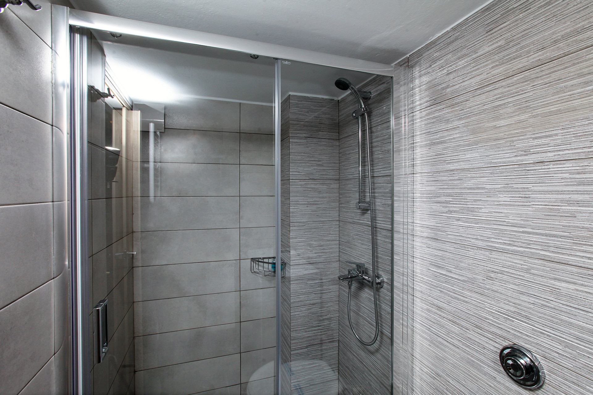 Glass-enclosed shower