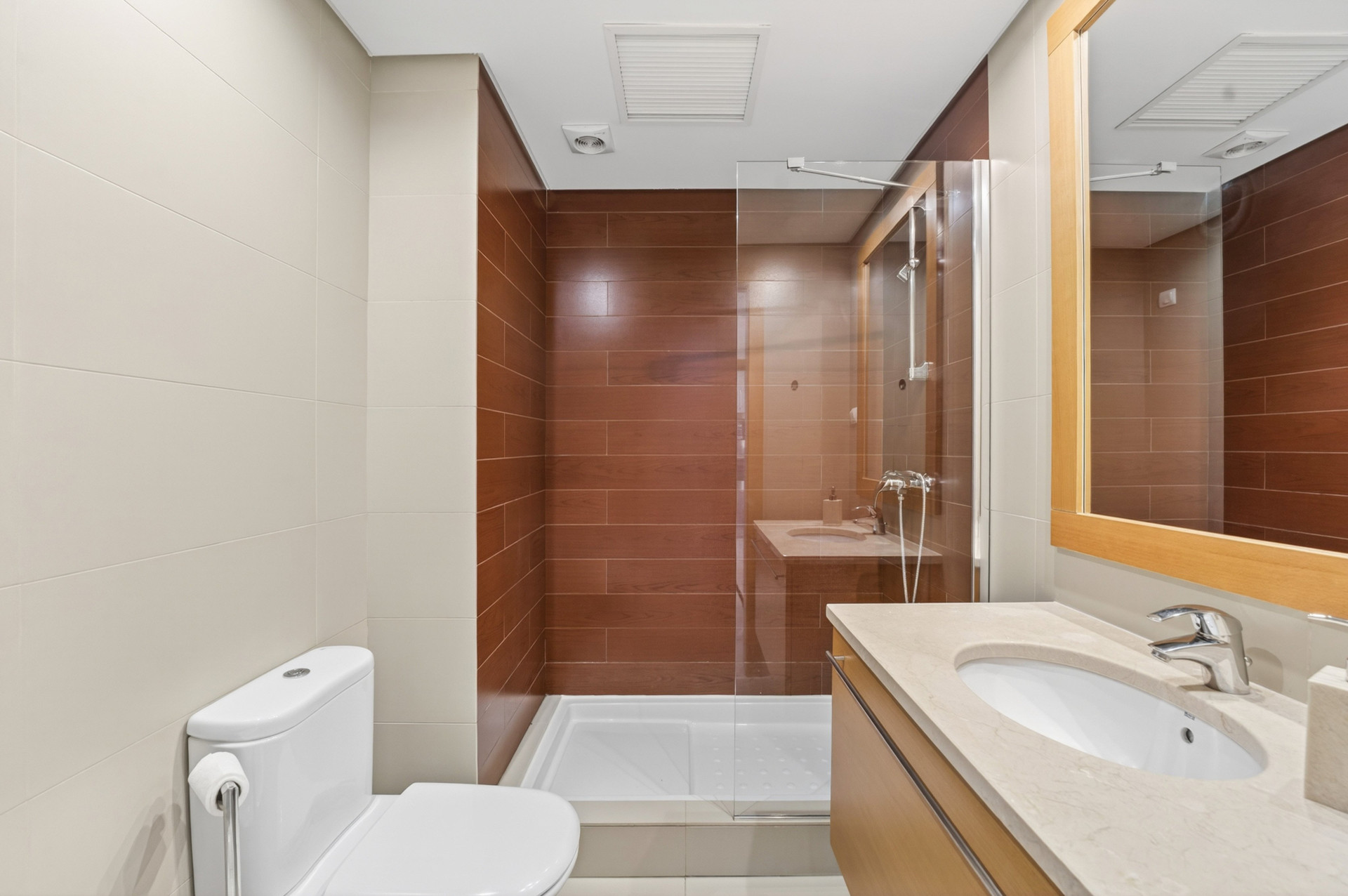 Bathroom with shower and vanity