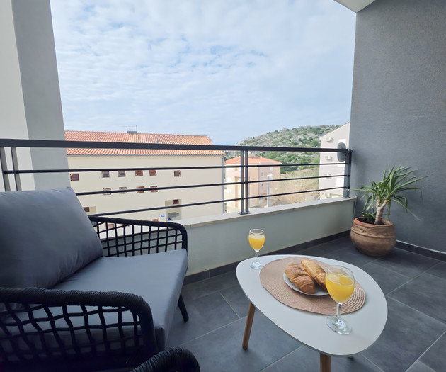 Balcony with view and breakfast