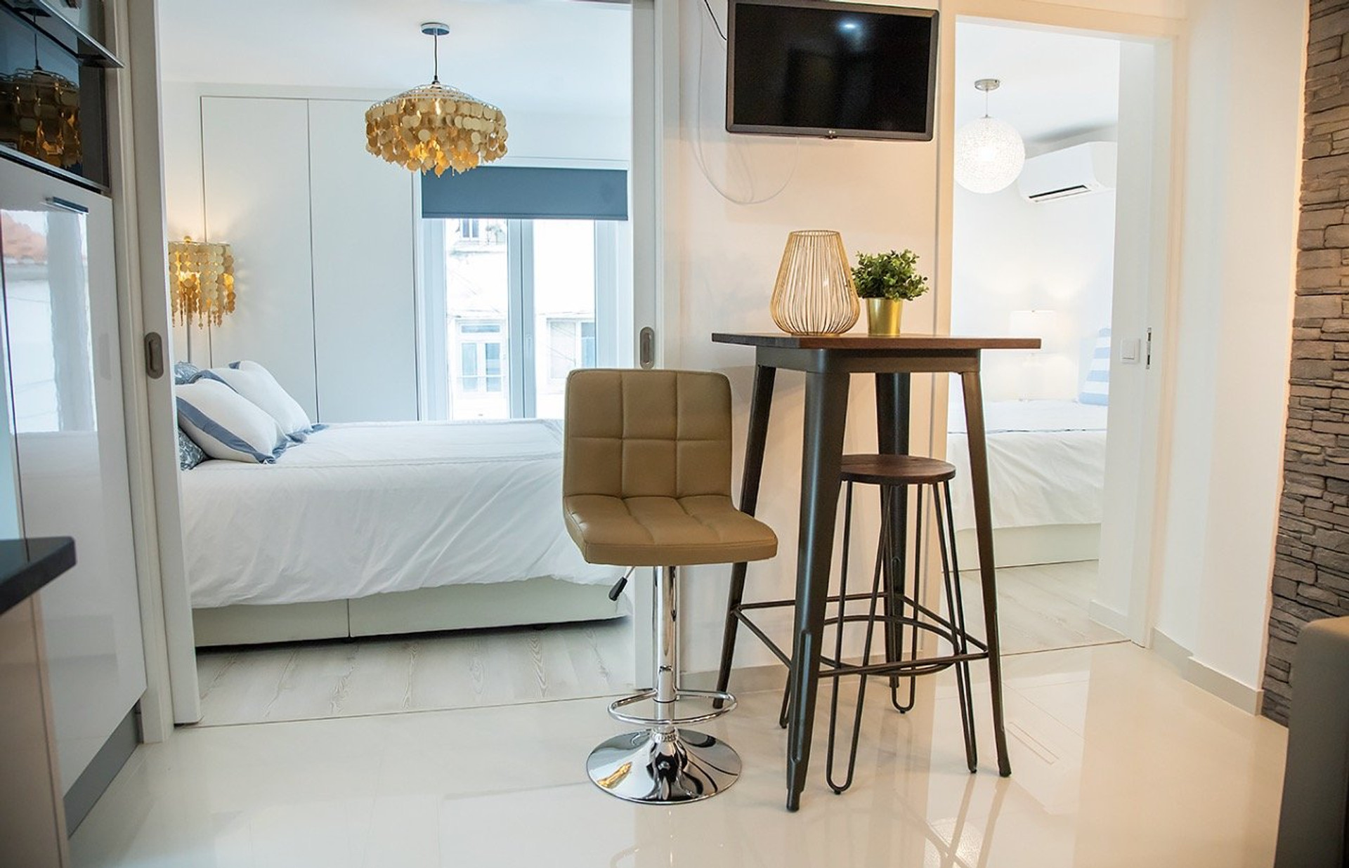 Open studio with bed and kitchen