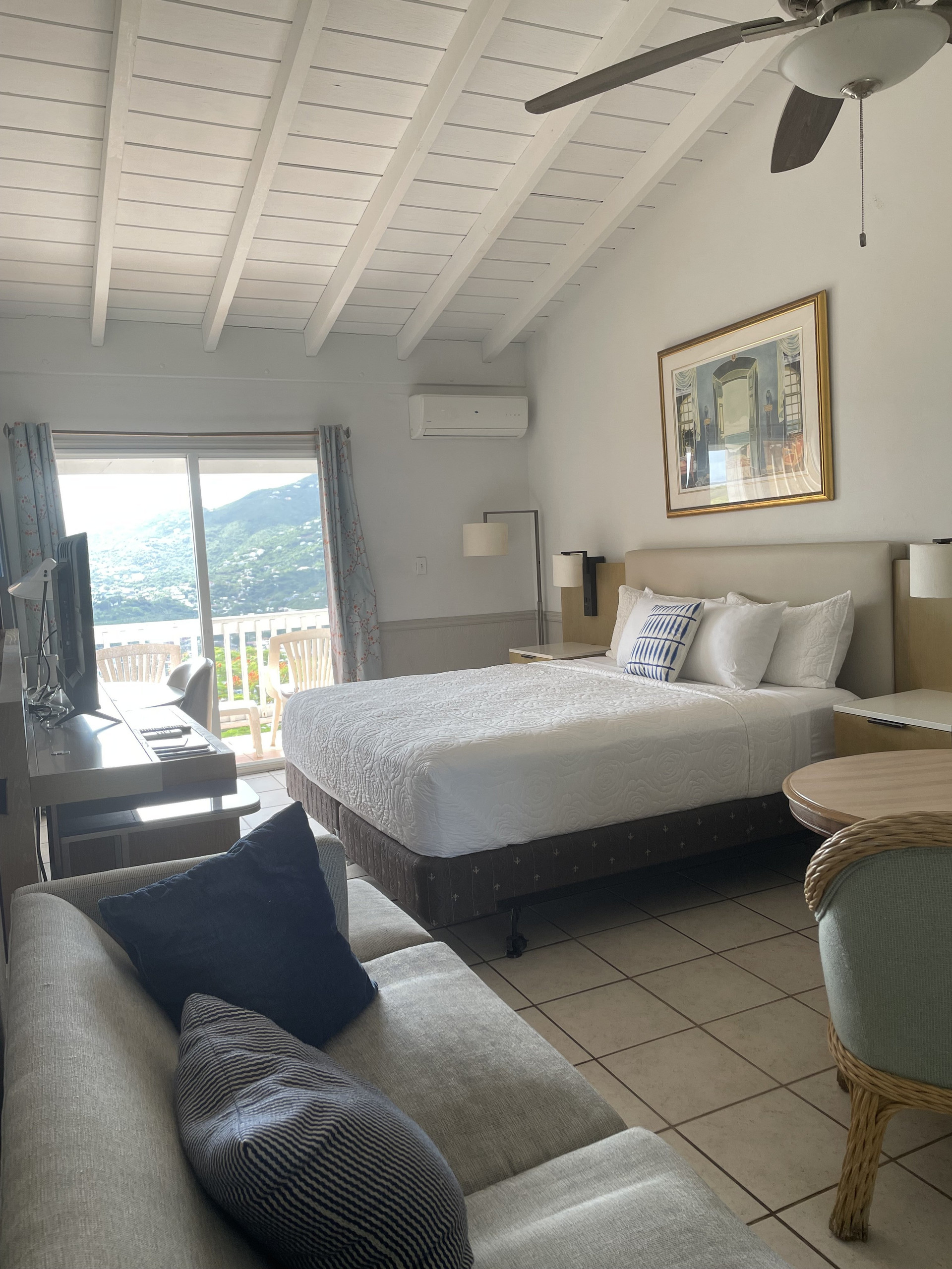 Bedroom with ocean view and sofa