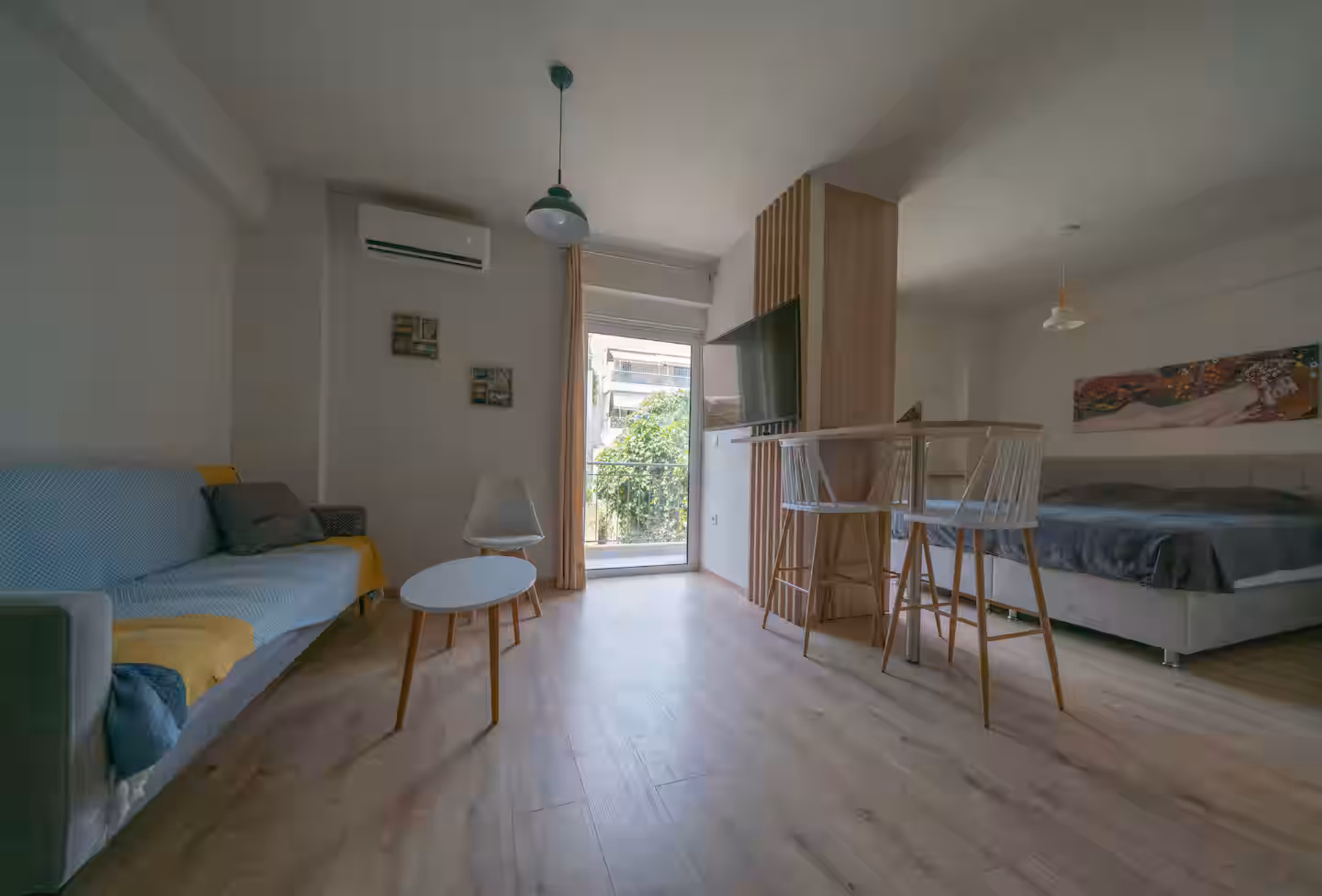 Open studio living area with balcony