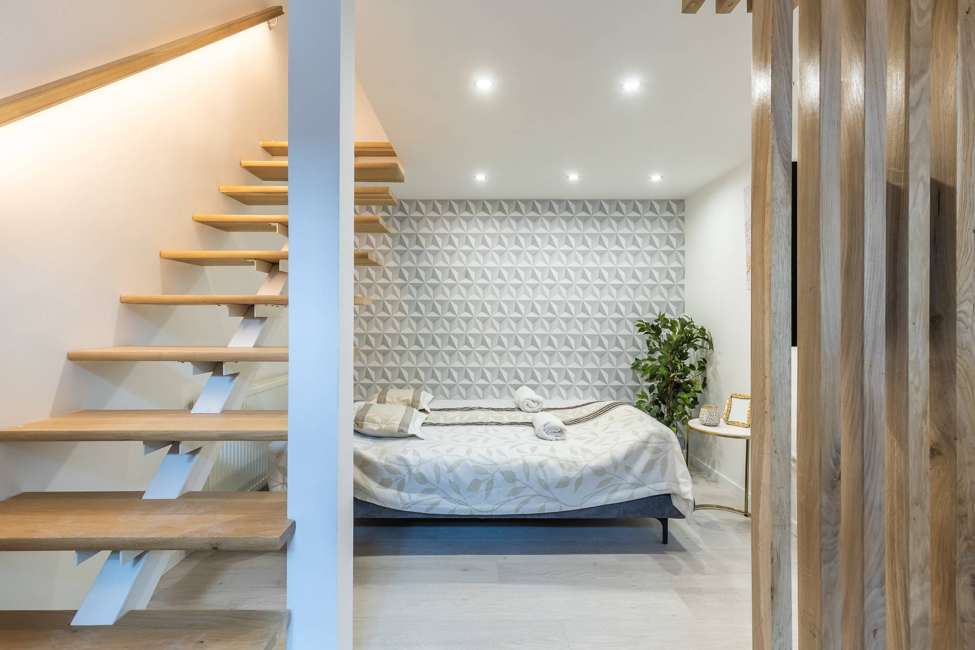 Bedroom with textured accent wall
