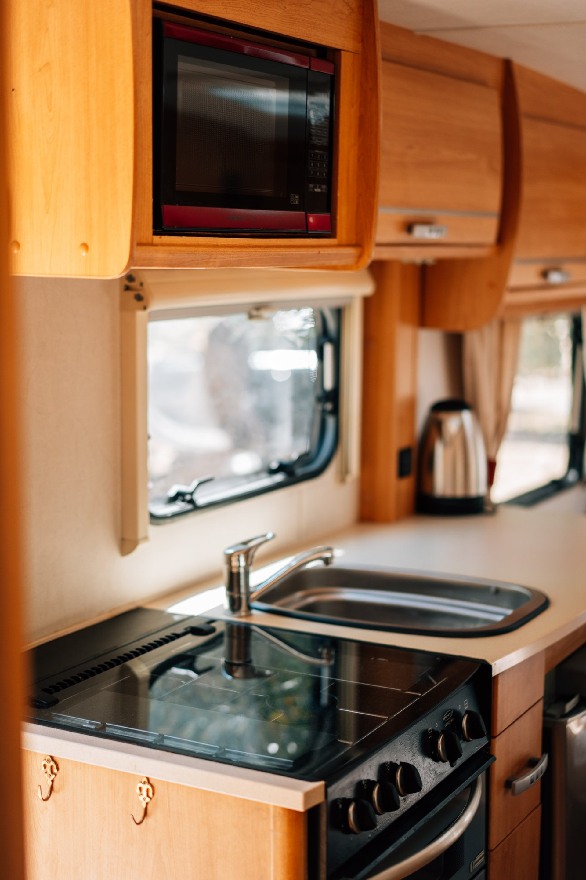 Kitchenette with microwave and stove