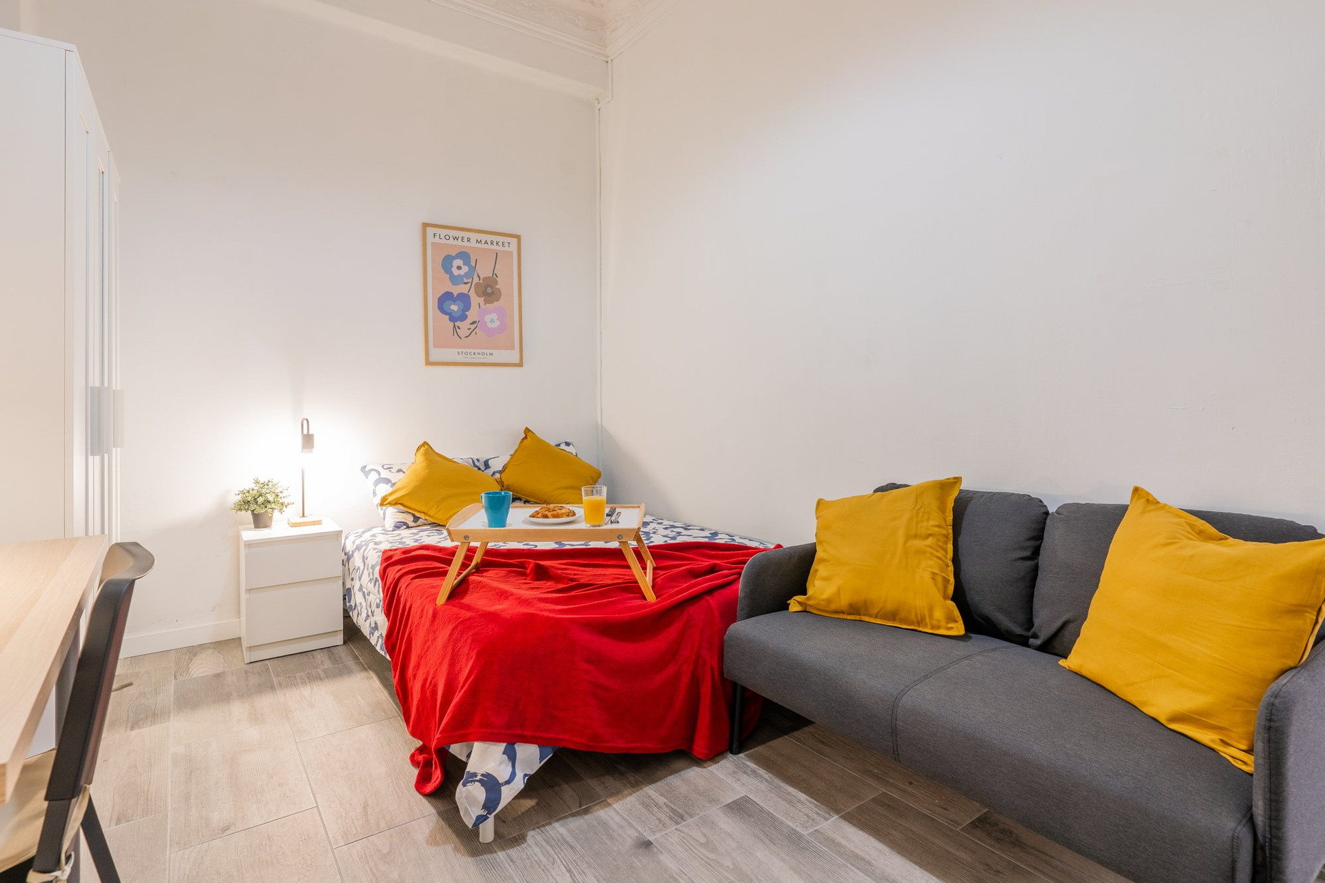 Bed and sofa seating area