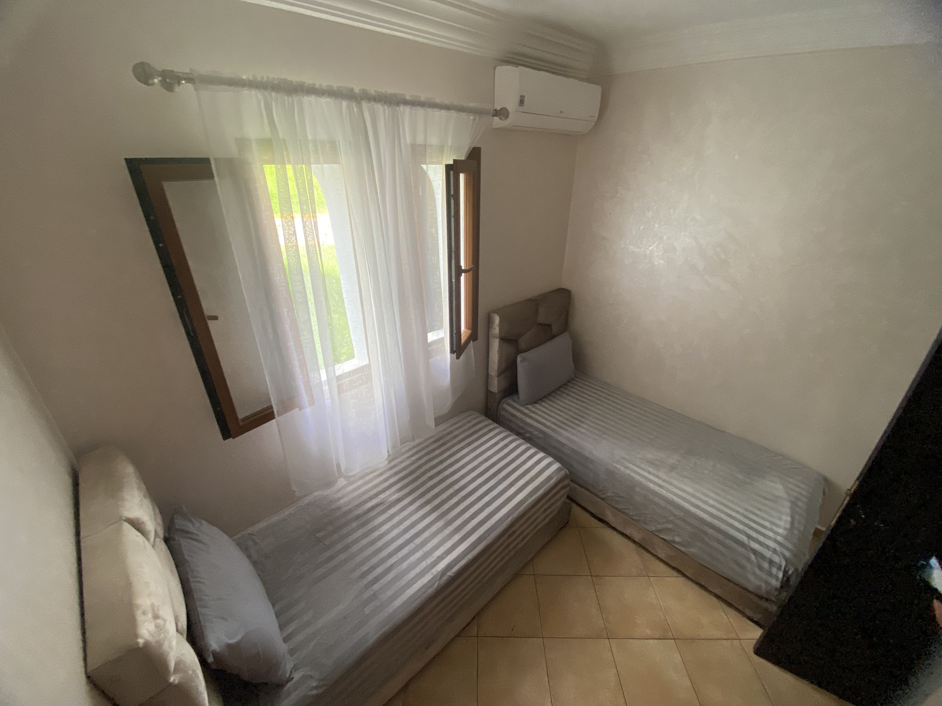 Twin bedroom with two single beds